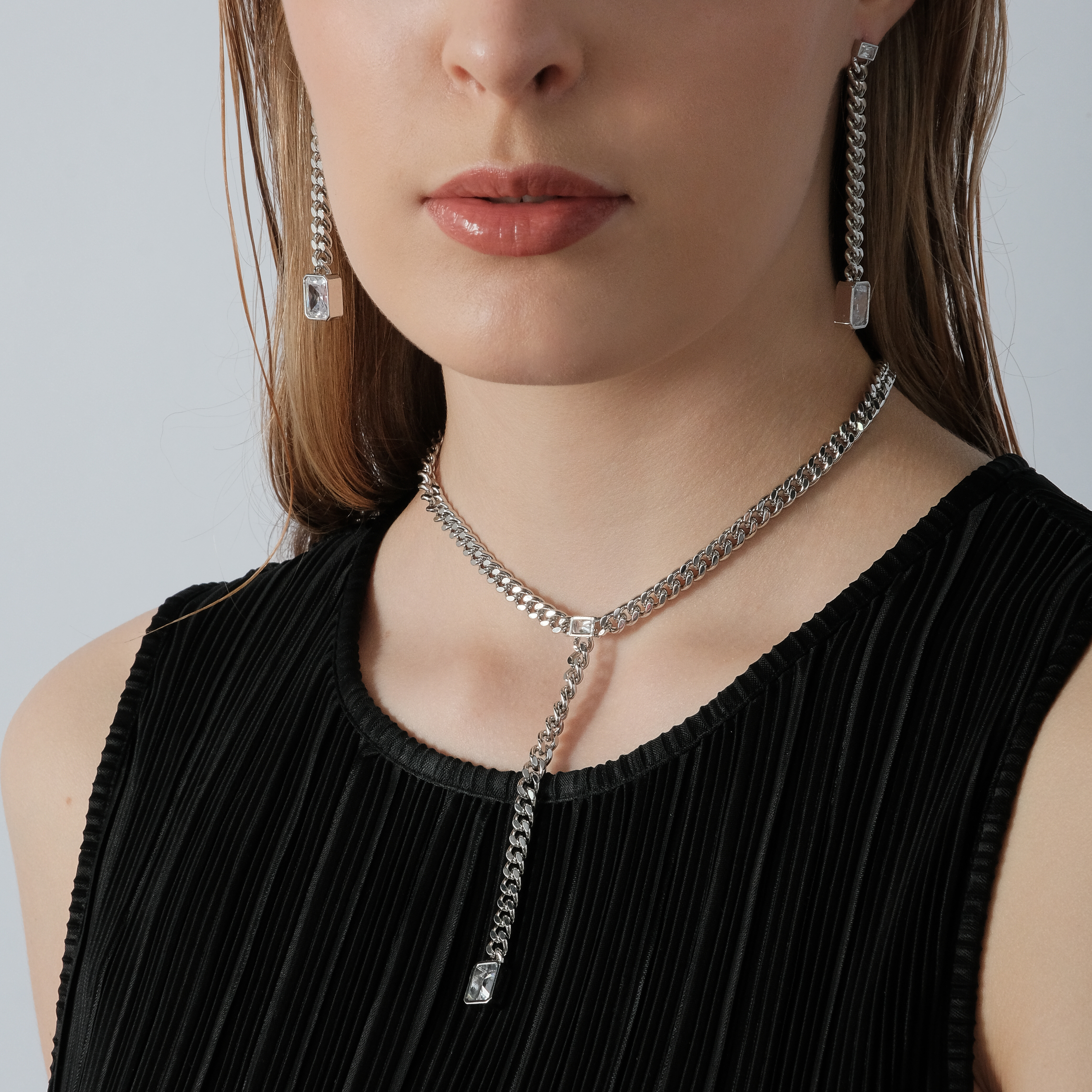 earrings with chains and large crystals