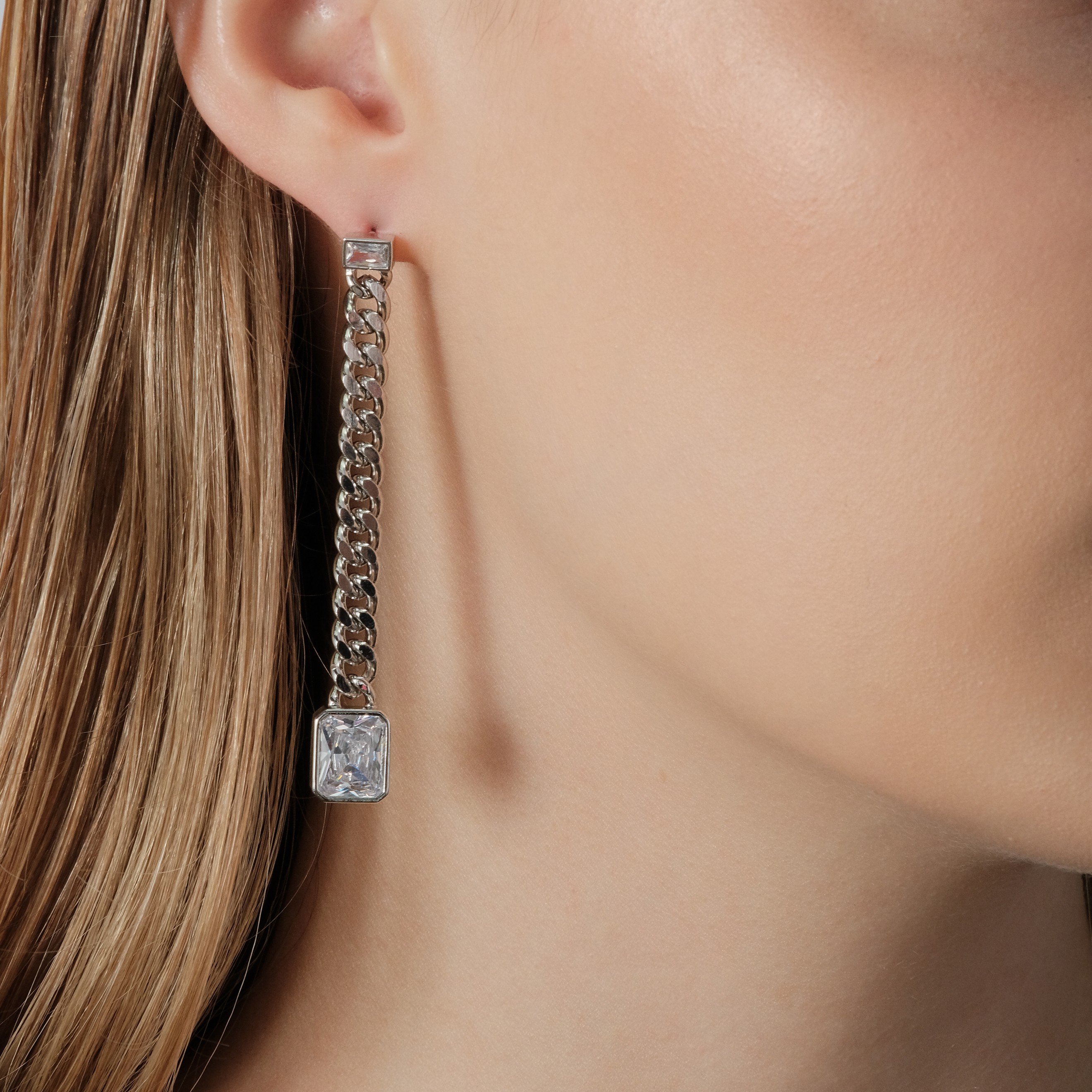 earrings with chains and large crystals