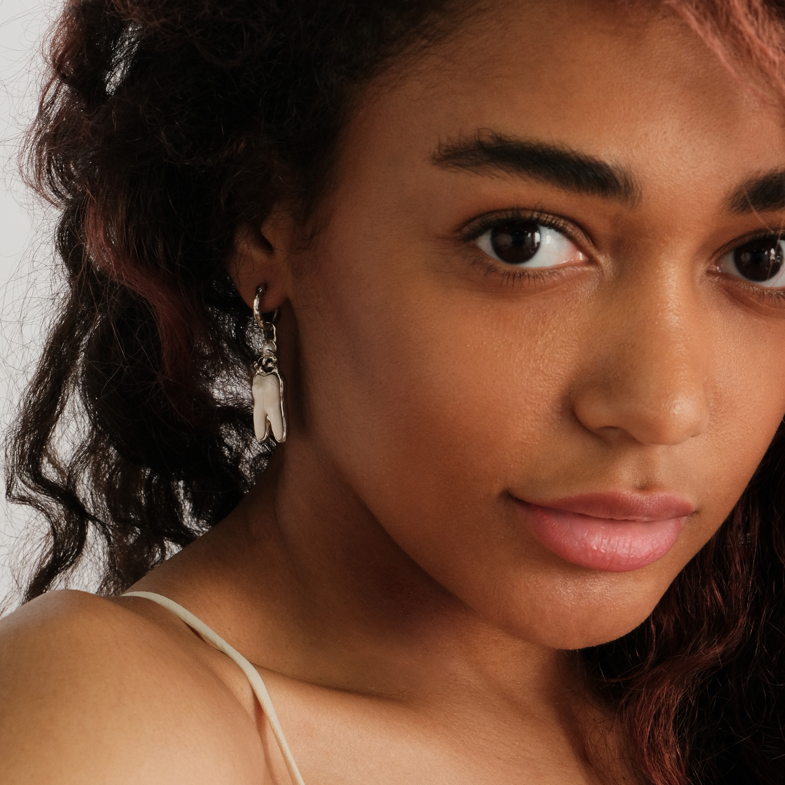 white brass teeth earrings
