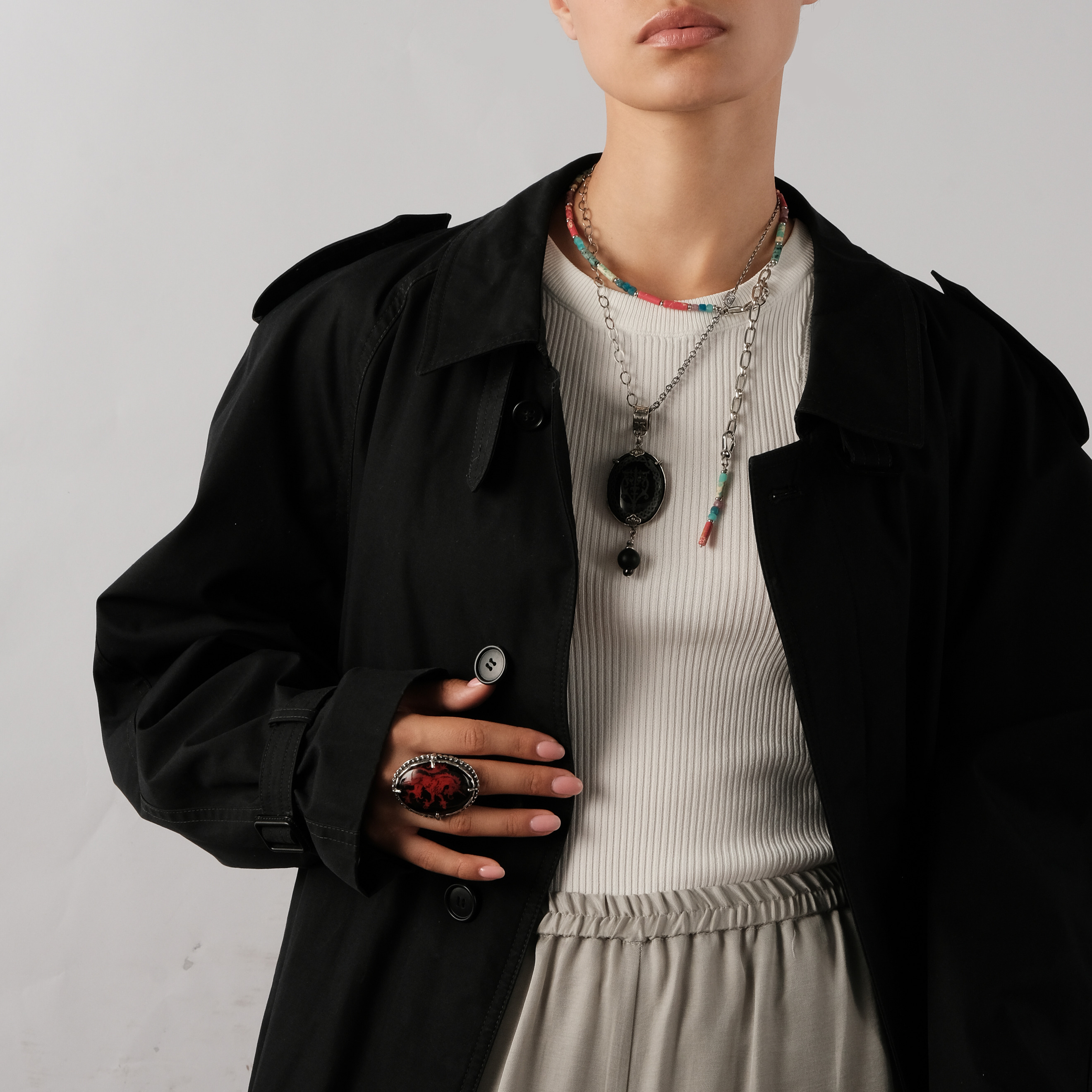 Silver pendant with onyx, tiger's eye and river pearls