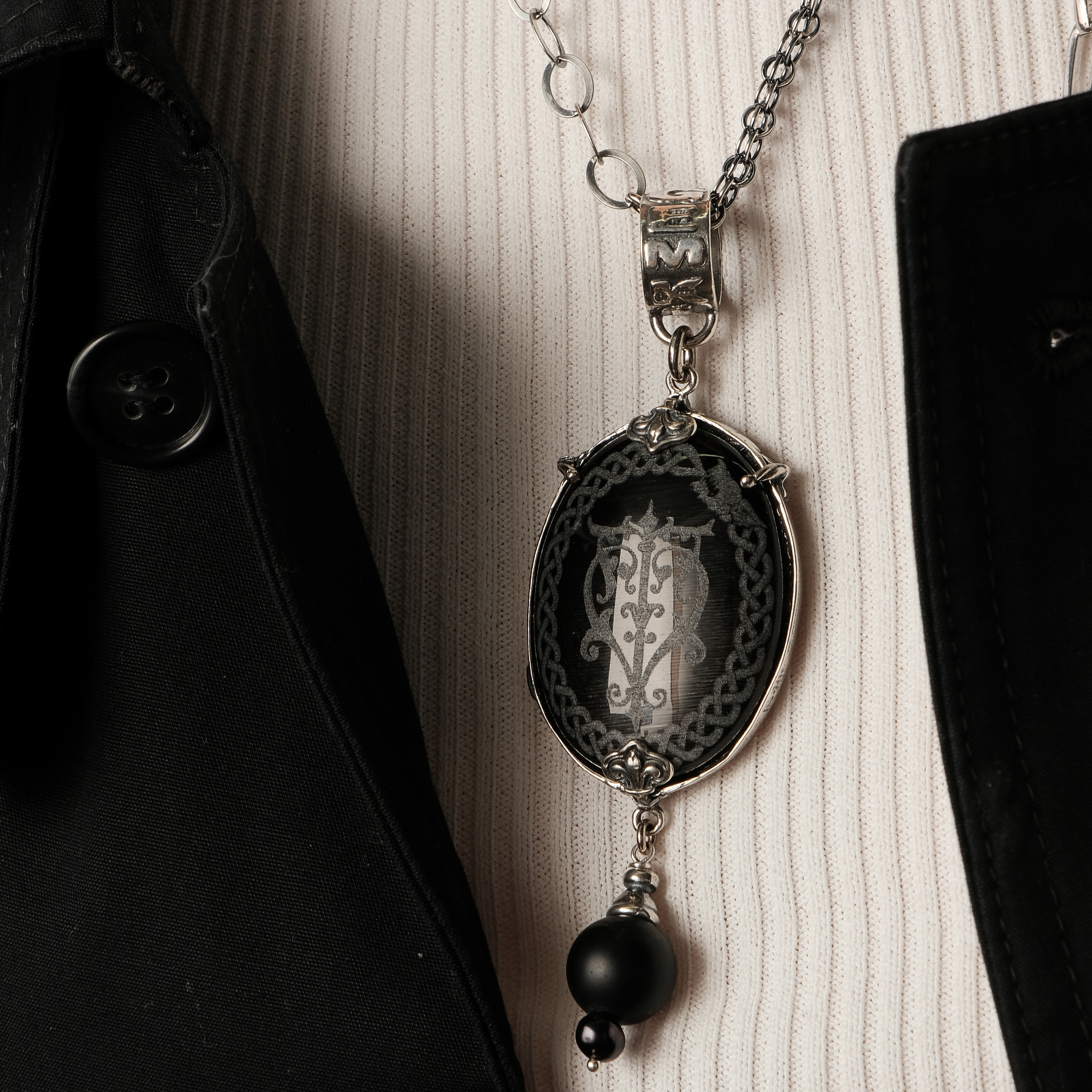 Silver pendant with onyx, tiger's eye and river pearls