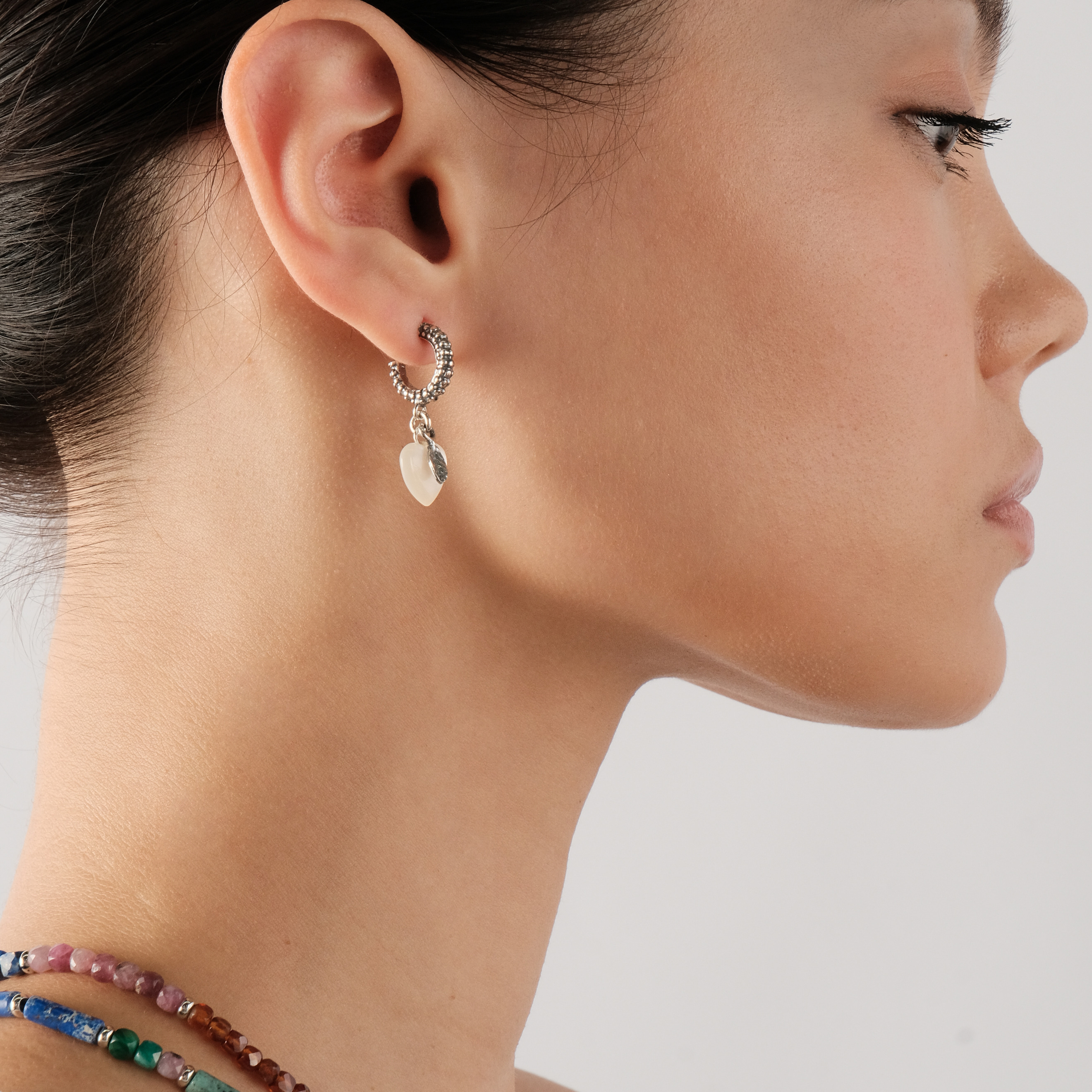 Silver heart earrings with mother-of-pearl insert