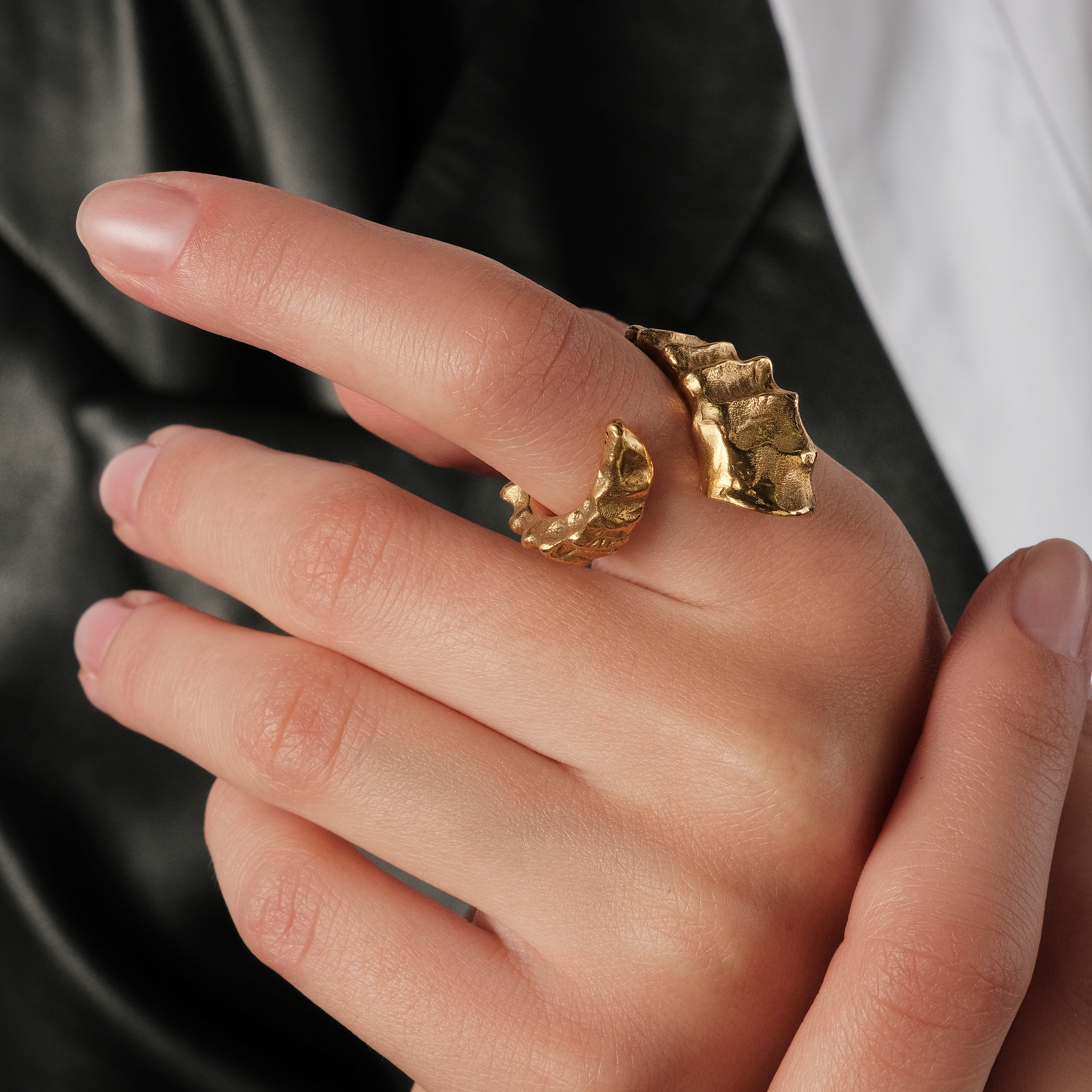 Ring made of bronze with gilding in the form of a horn