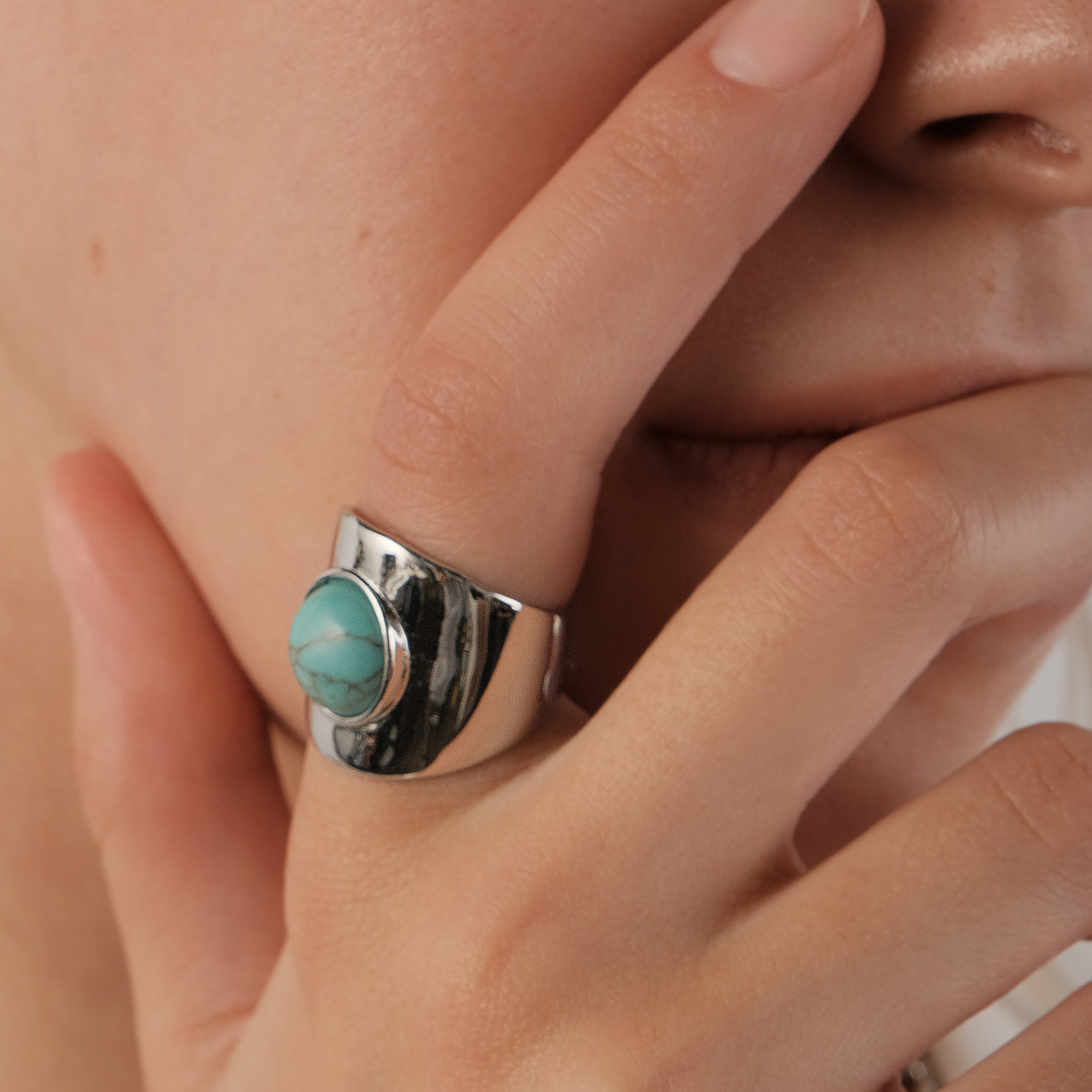 ring with round green insert