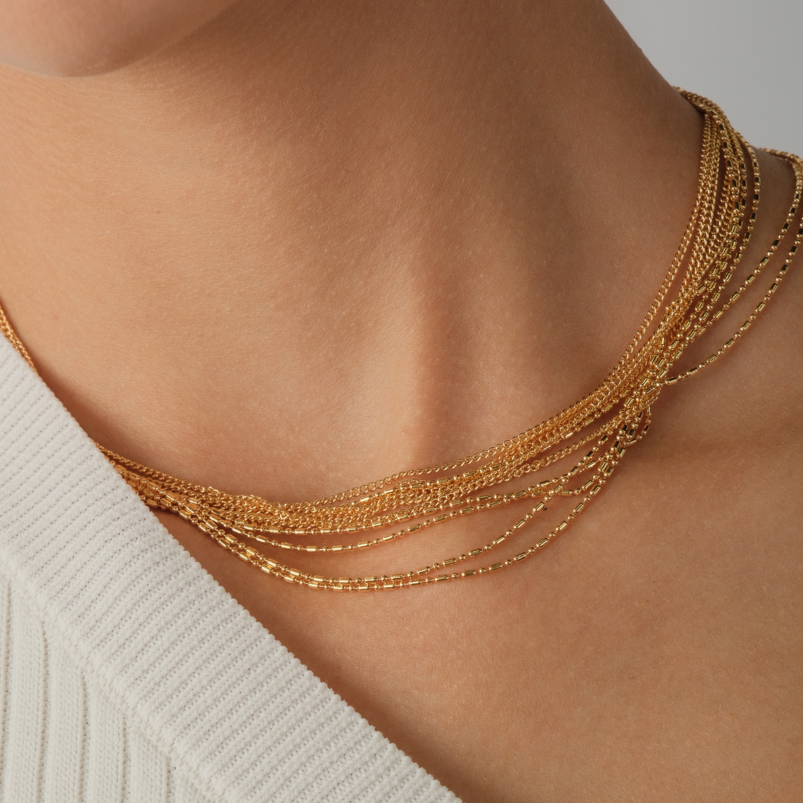 multi-layered necklace with thin chains