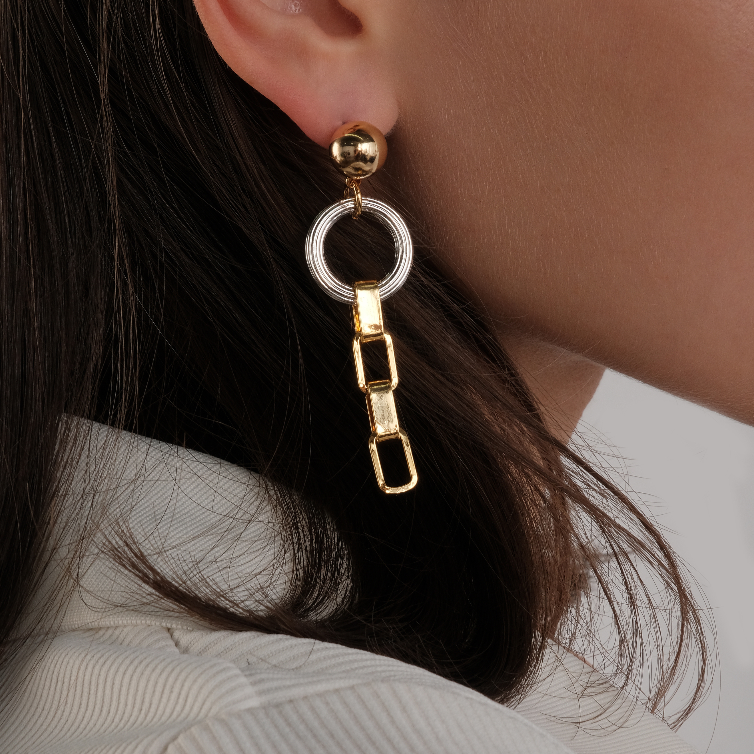 earrings with a silver heart with crystals and a circle