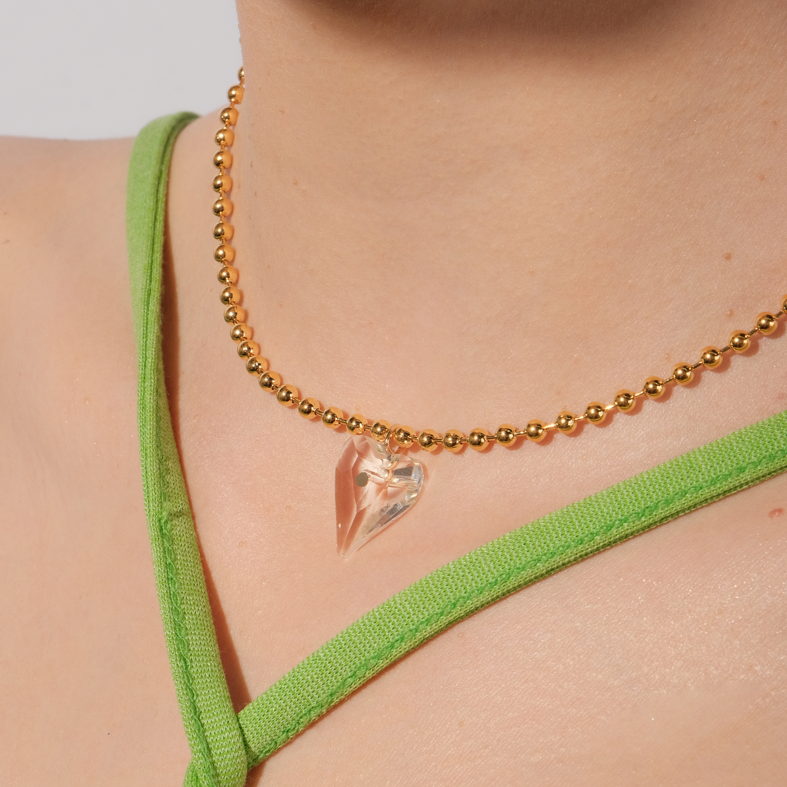 necklace with beads with a transparent heart