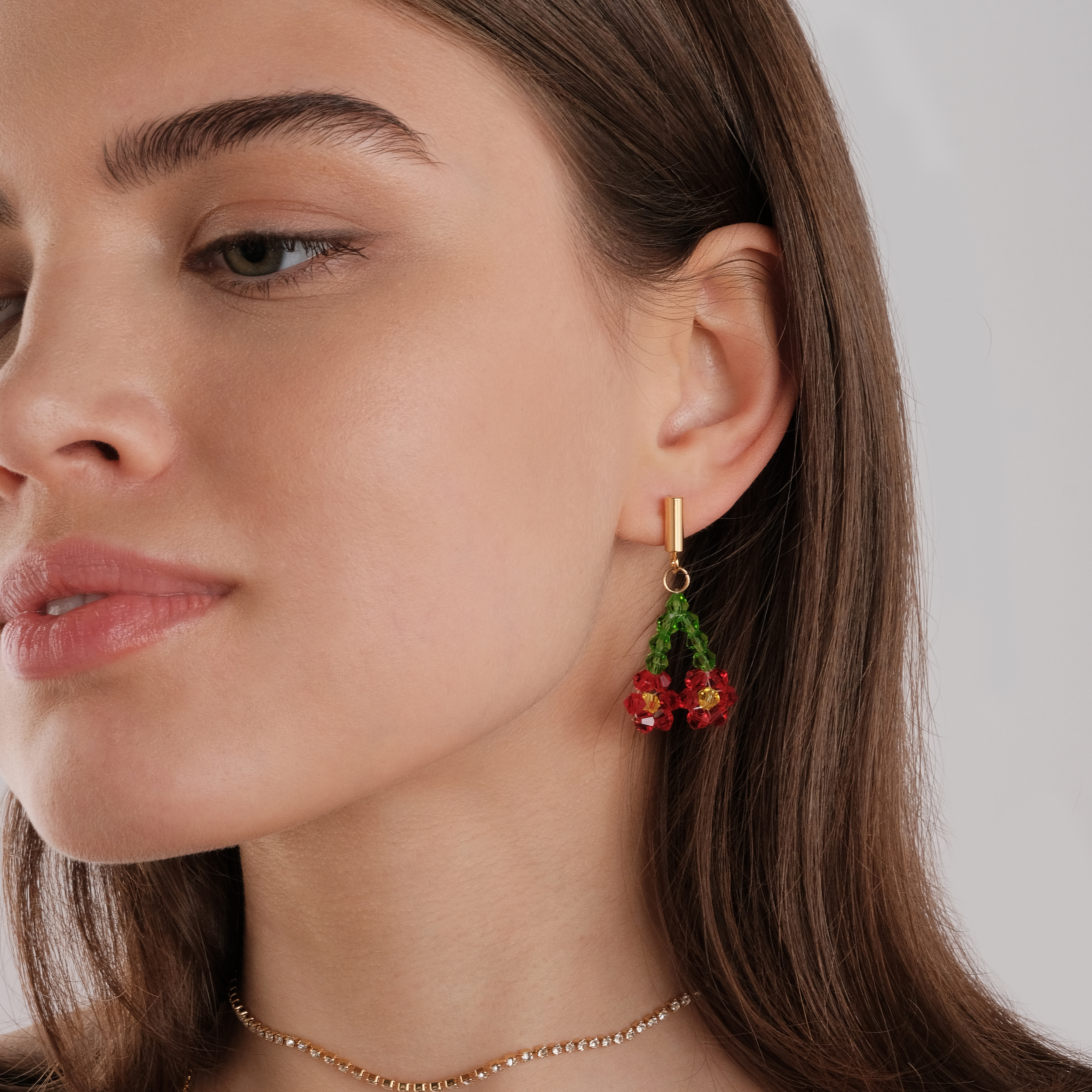 Earrings with red beaded flowers