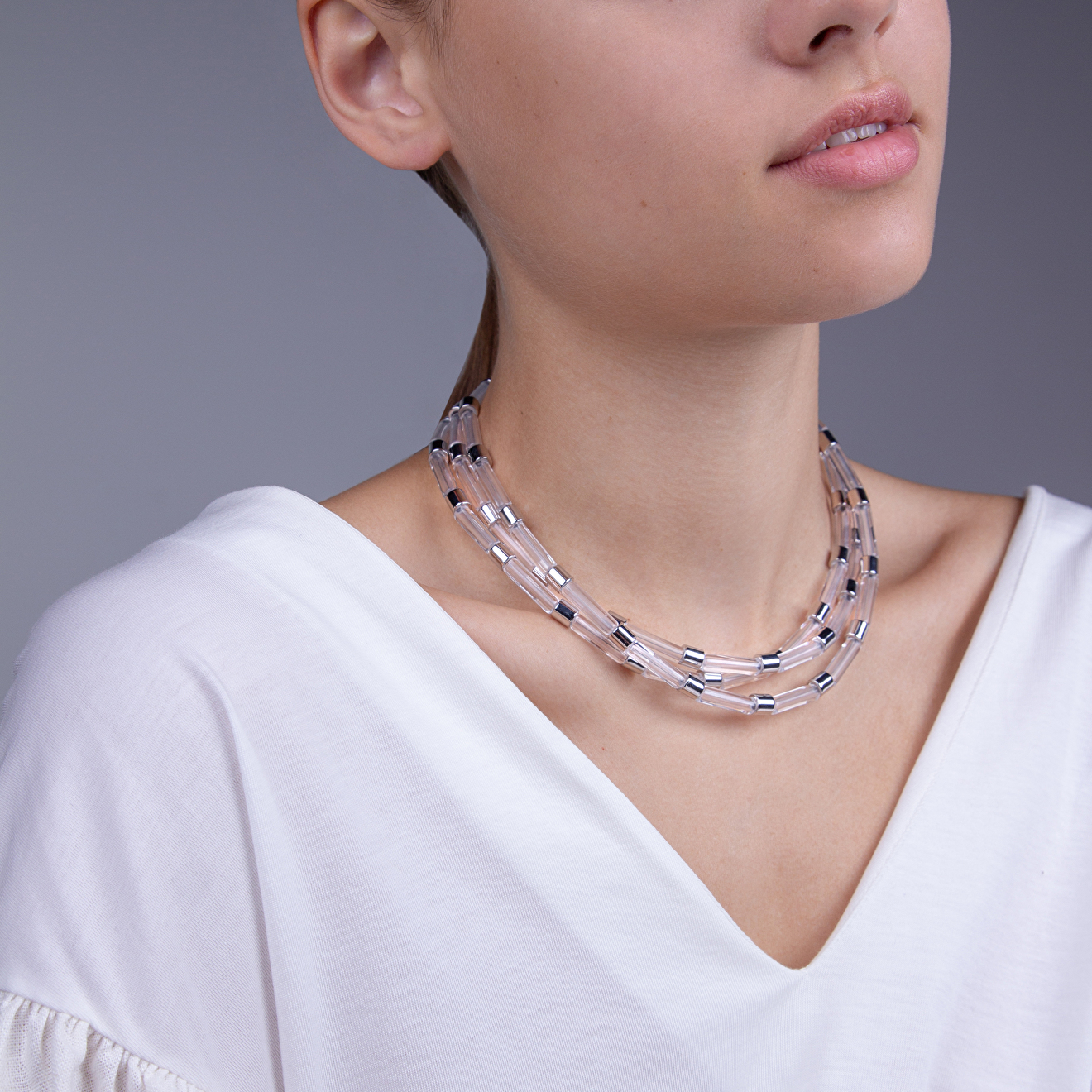 triple necklace with transparent cylinders