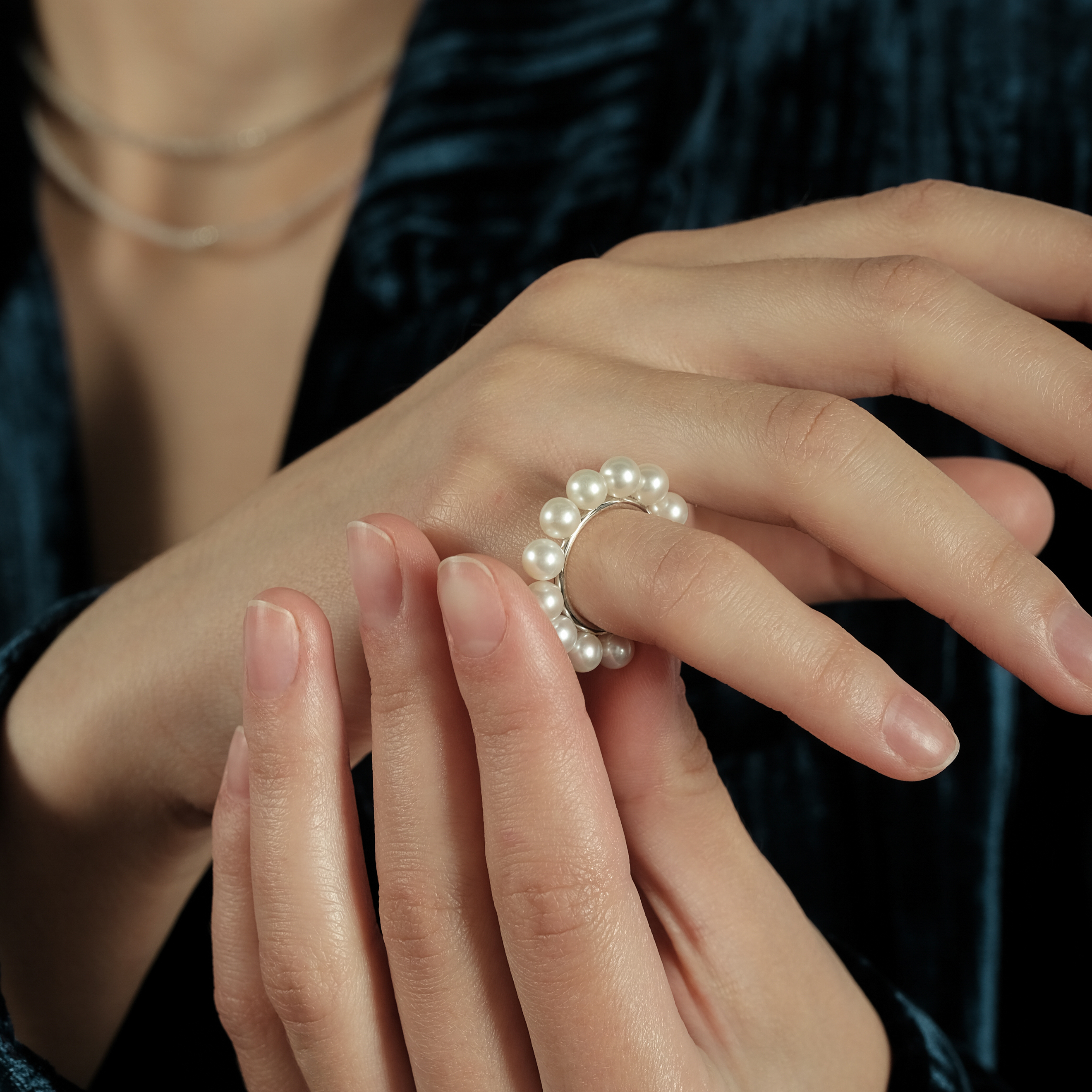 White gold ring with pearls