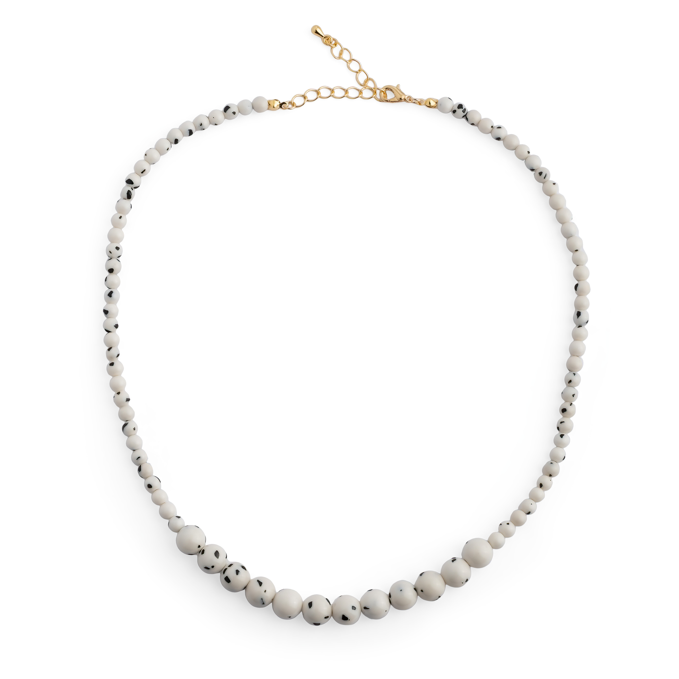 White necklace made of beads of different sizes