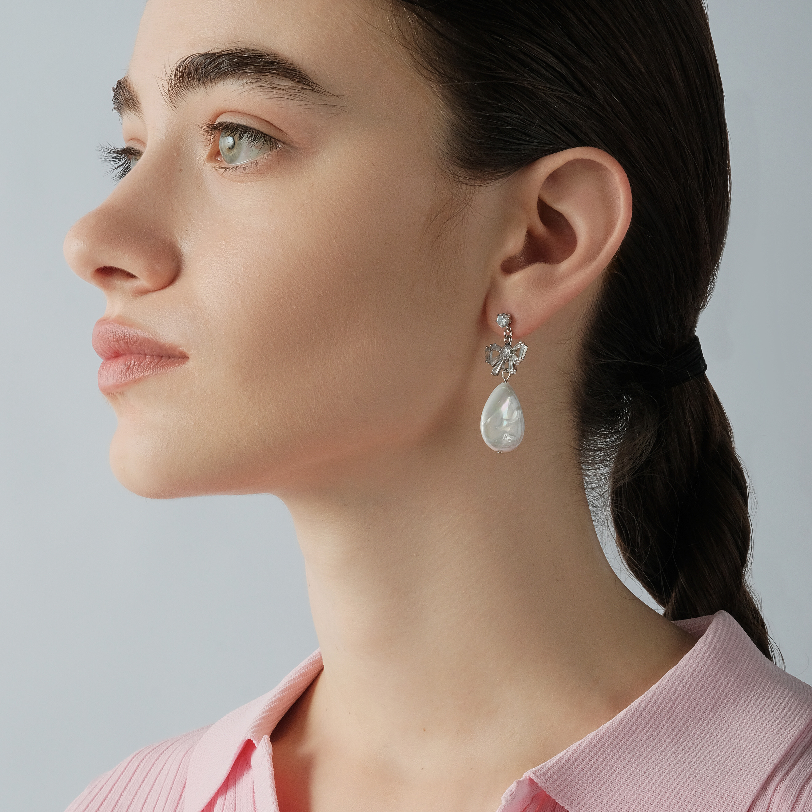 Earrings with bows and pearl pendants