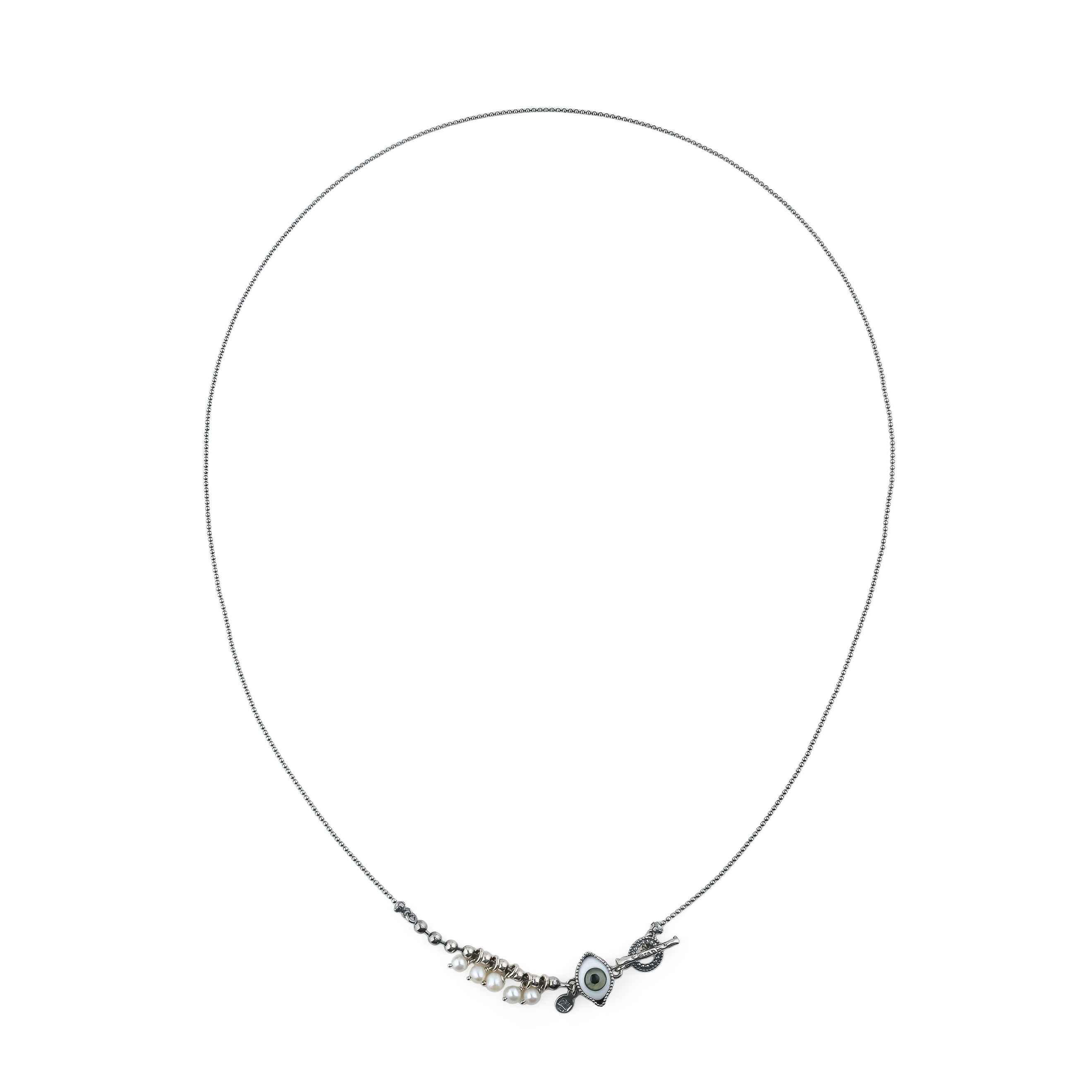 Silver medallion with an eye and pearls