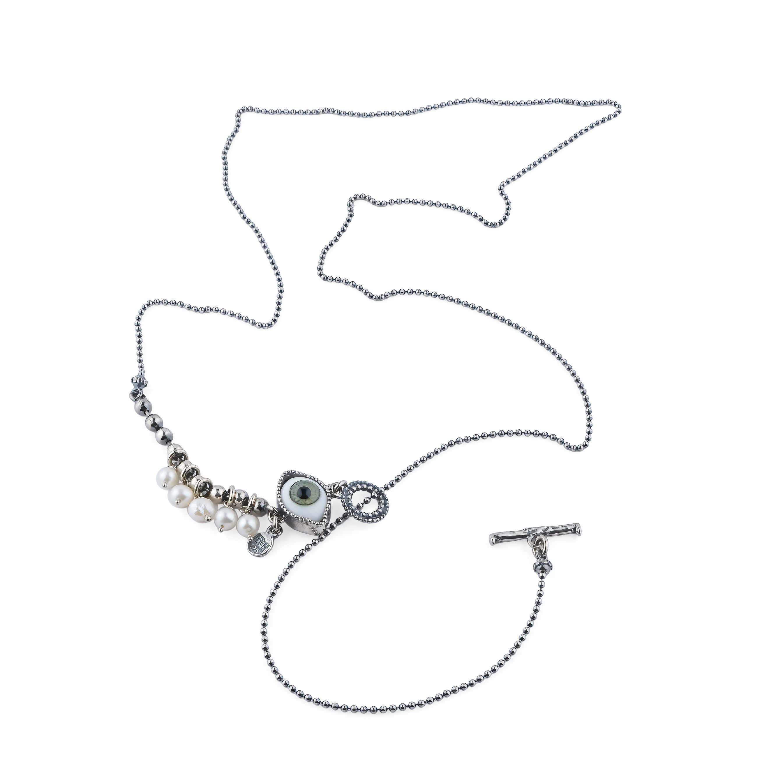 Silver medallion with an eye and pearls