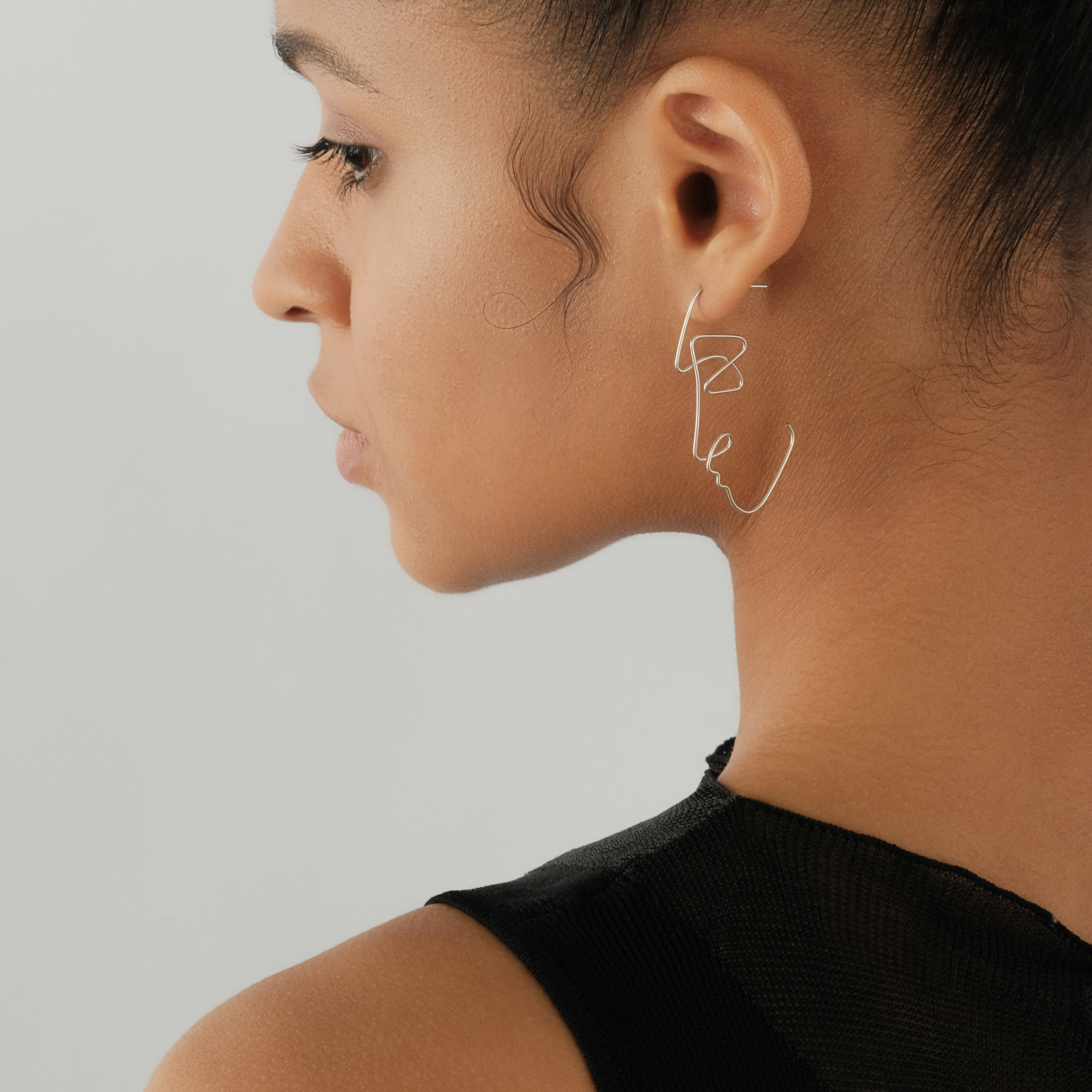Gold plated profile earrings