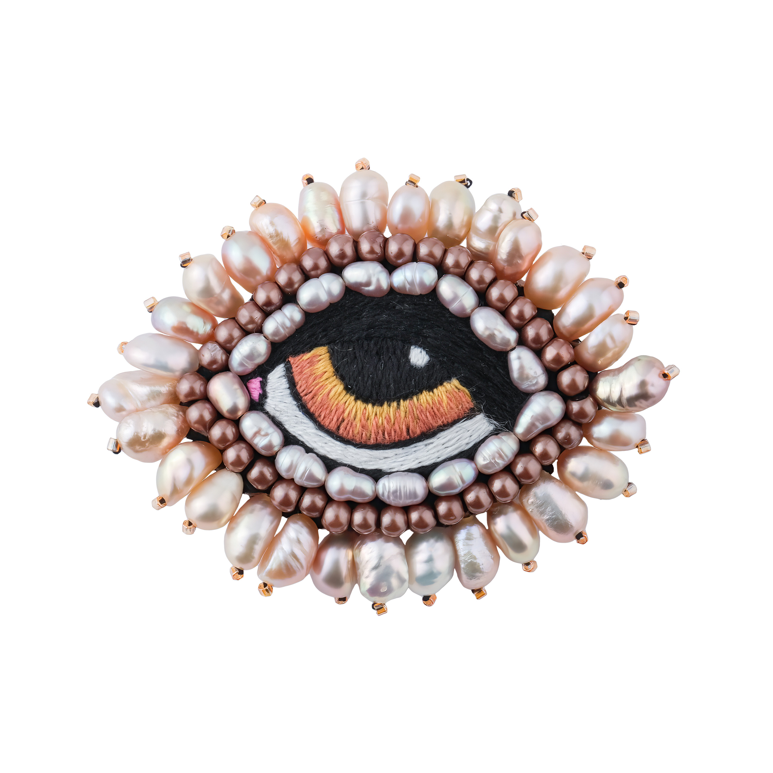 A small brooch in the form of an eye with brown pearls
