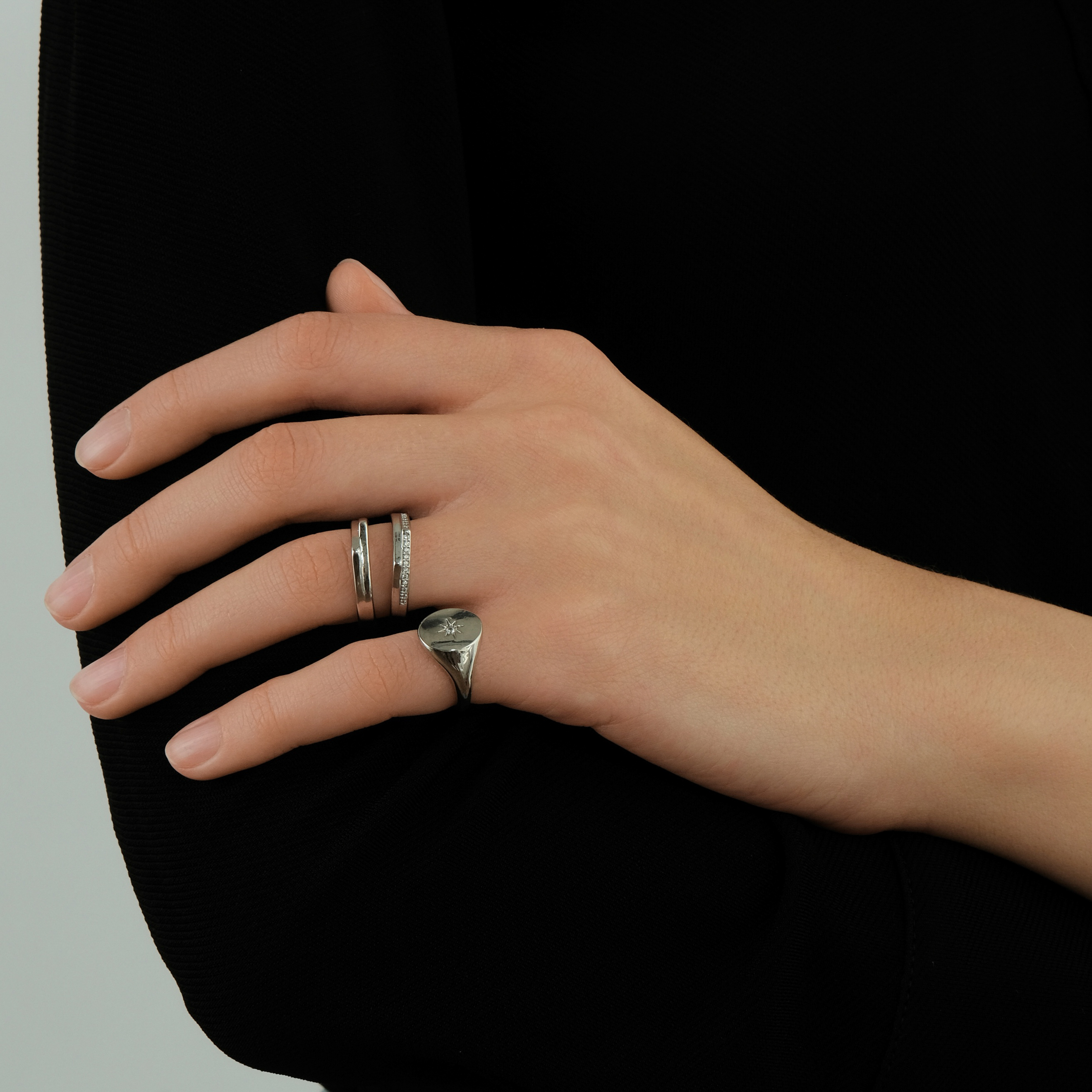 ring with crystals and two corners