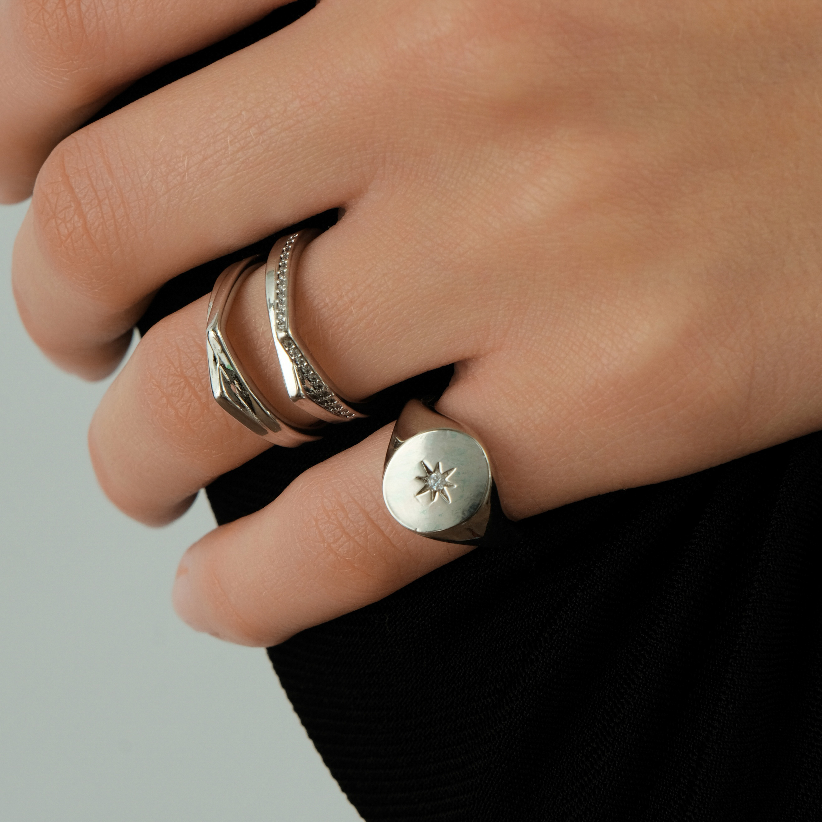 ring with crystals and two corners