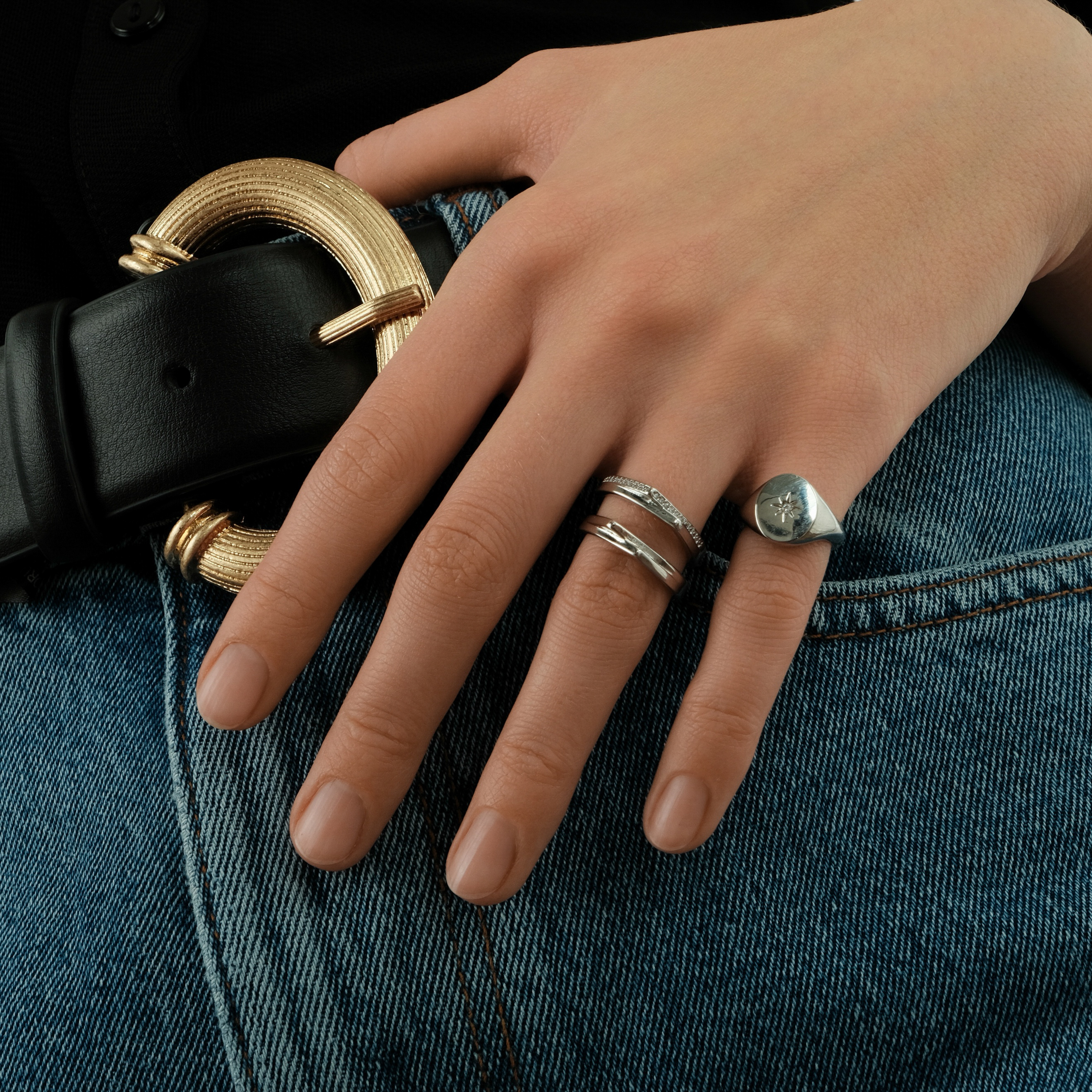 ring with crystals and two corners