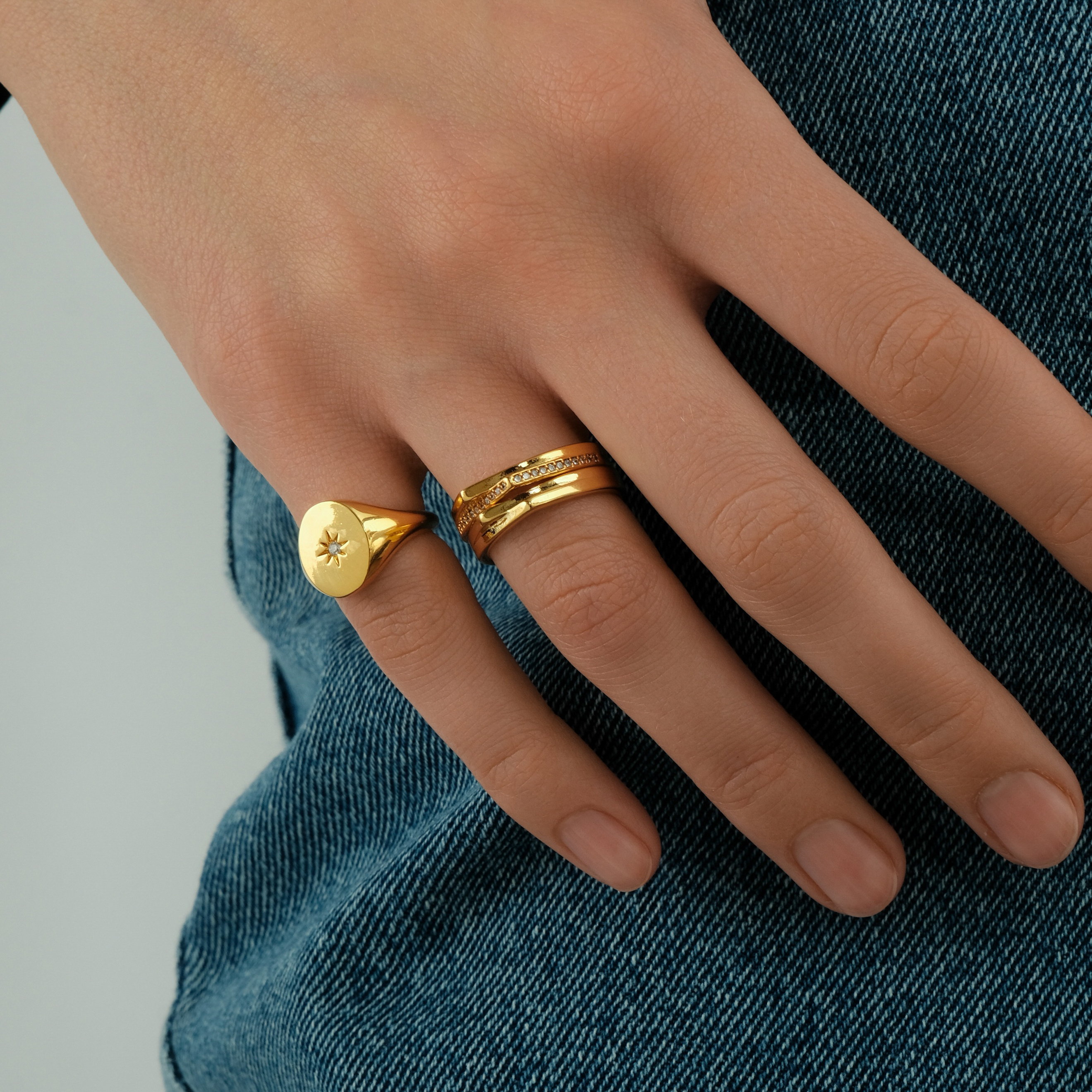 ring with crystals and two corners
