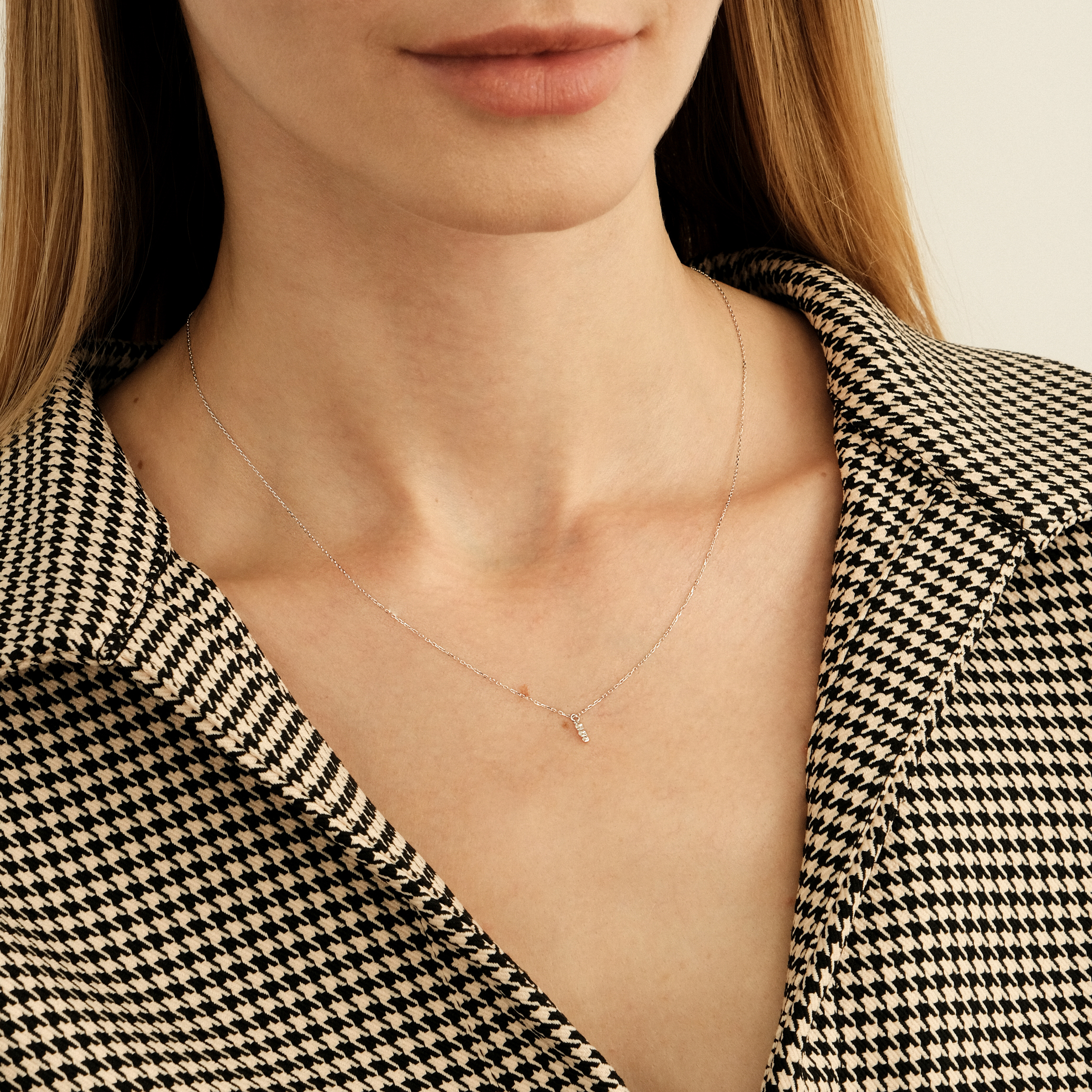 Pendant on a white gold chain with diamonds