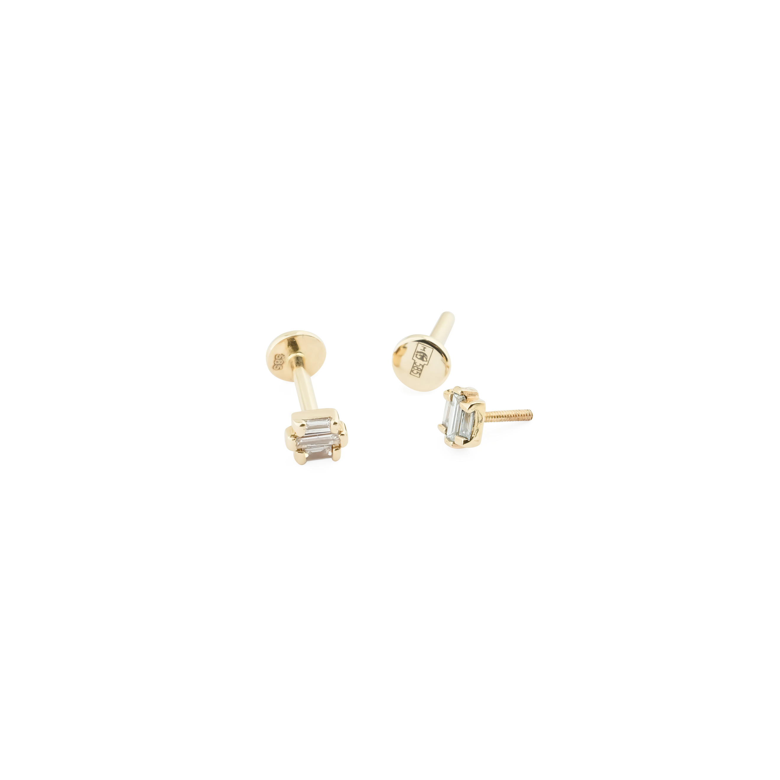 Labrettes made of gold with diamonds