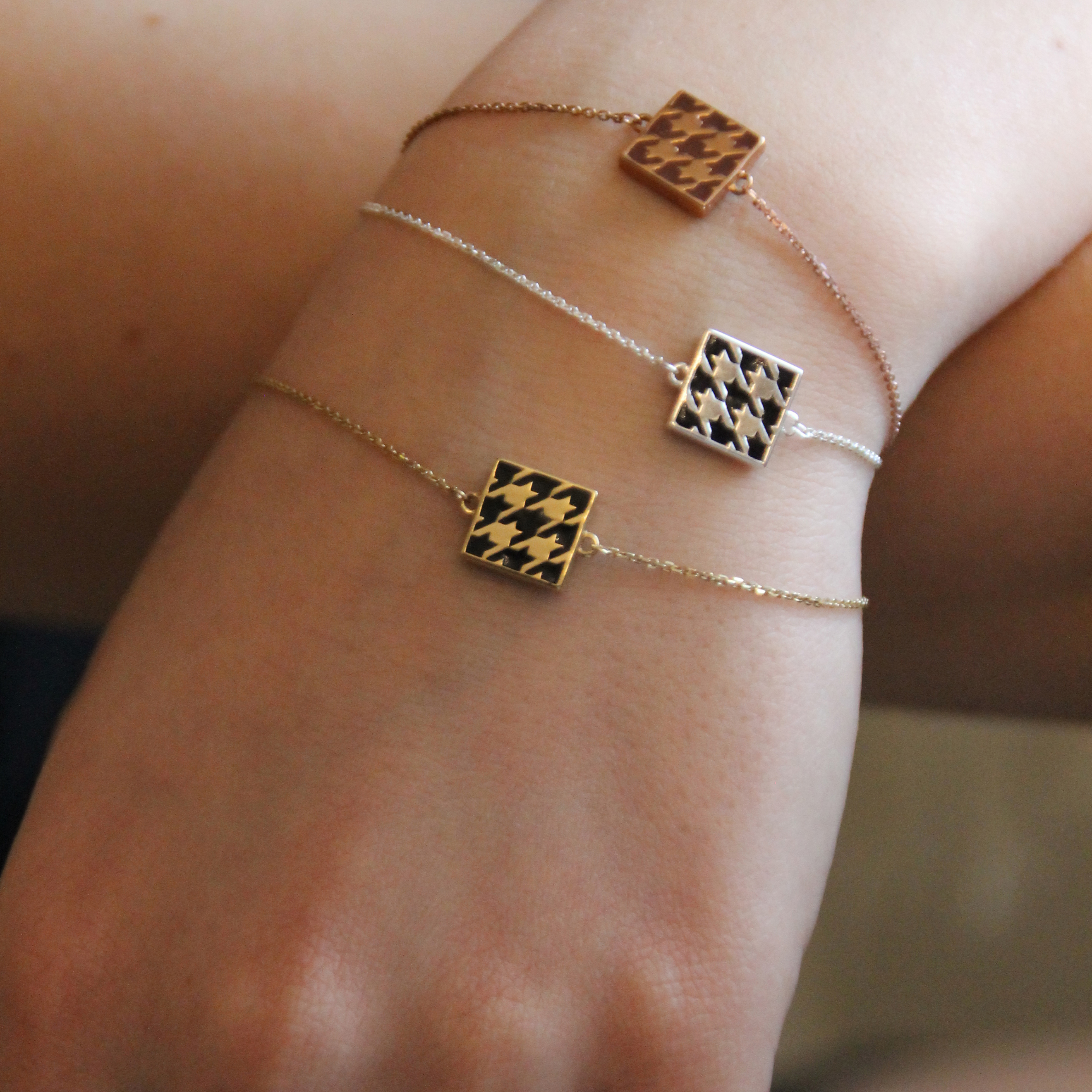 Rose gold plated double-sided silver bracelet with a "crow's foot" pattern made of fluorescent