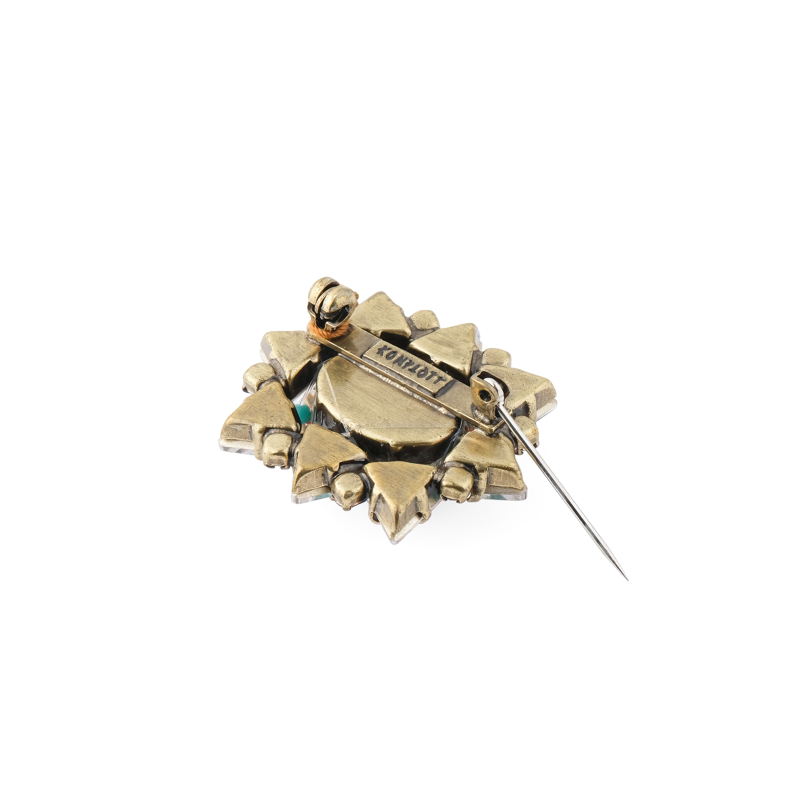 Hippie brooch with green crystal