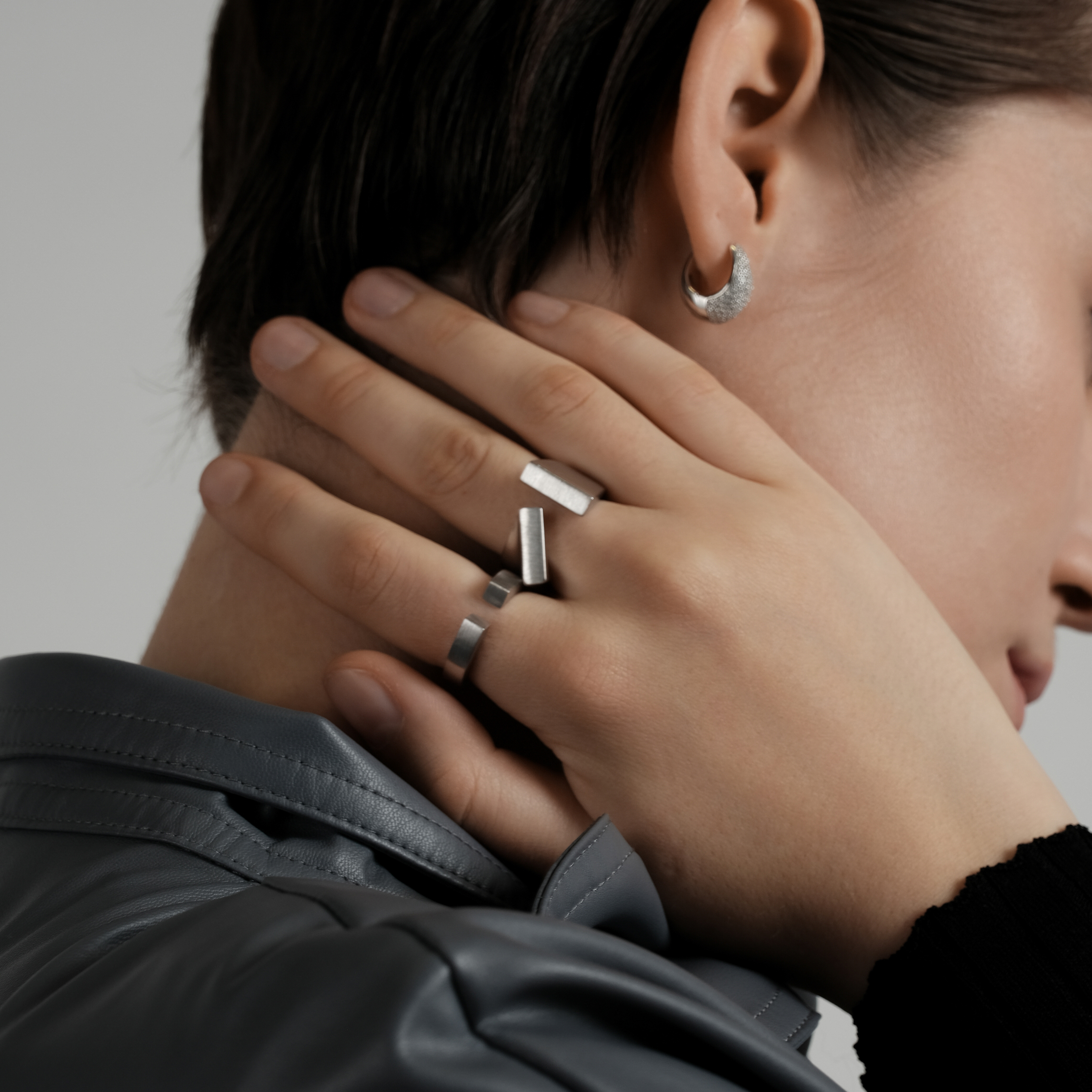 Asymmetric open-ended Tilt Ring made of silver