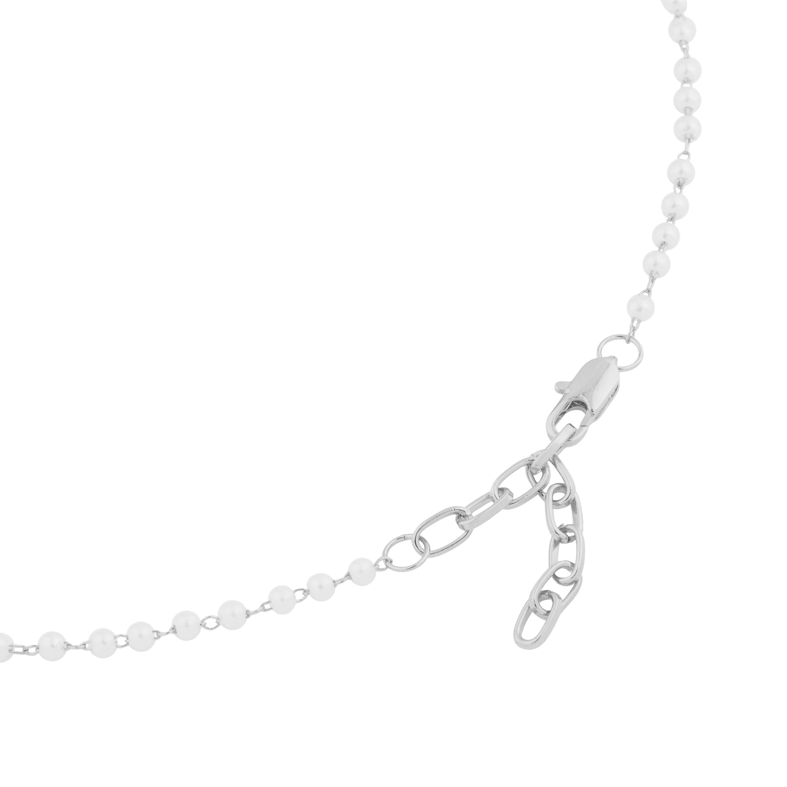 Necklace with pearls and a bear pendant with crystals