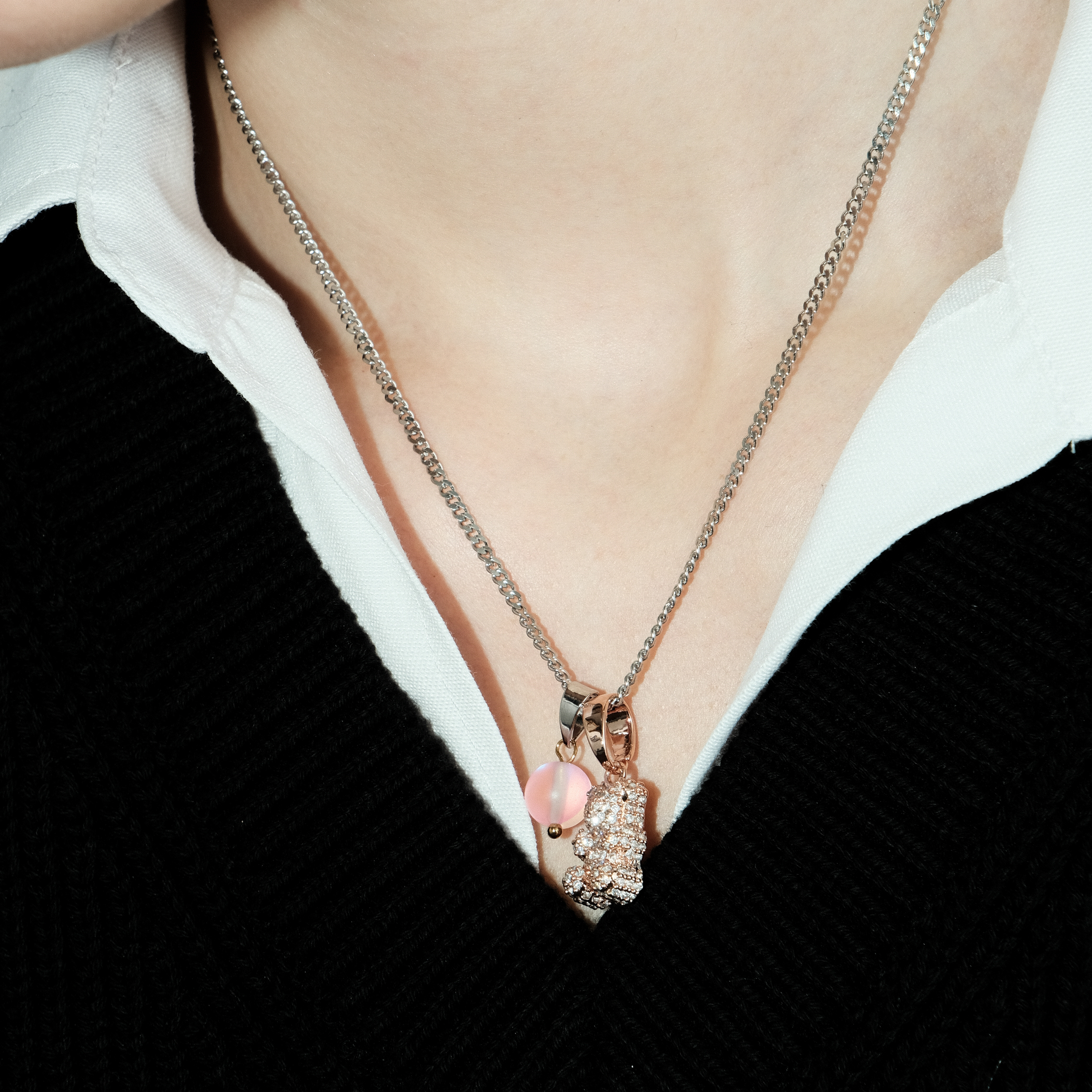 Necklace with pink teddy bear pendant and pink bead