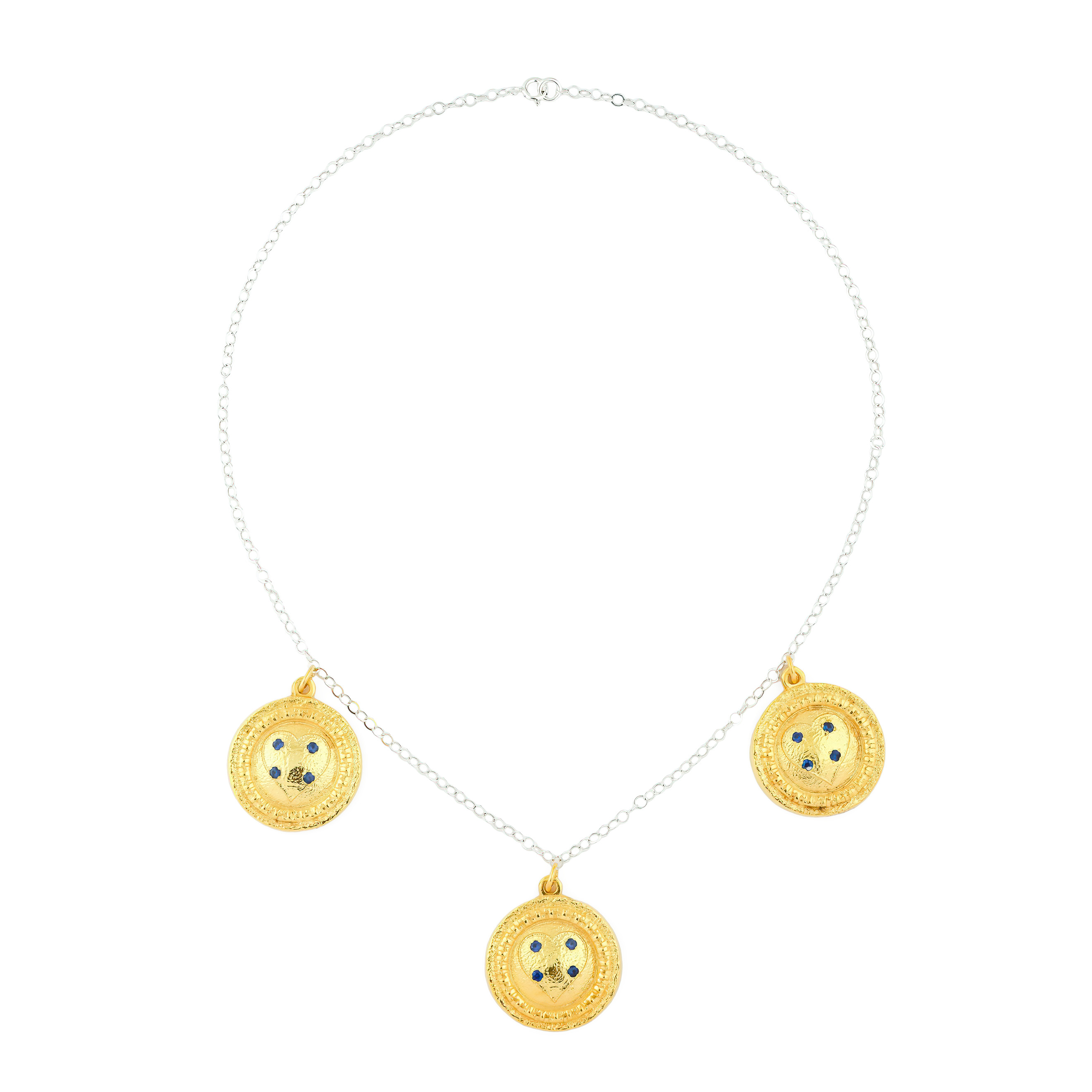 necklace with gilded round pendants with blue crystals