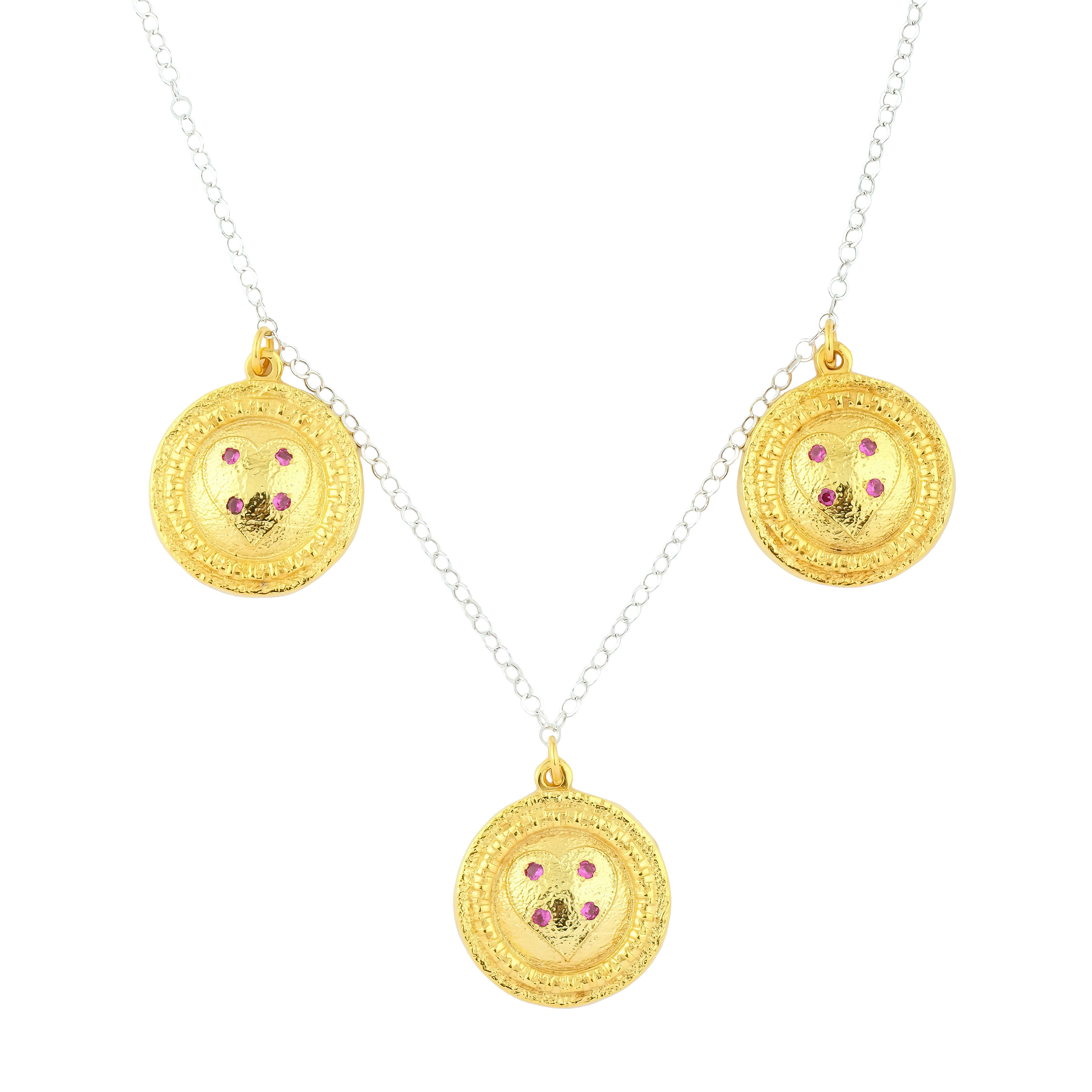 necklace with gold-plated round pendants with red crystals