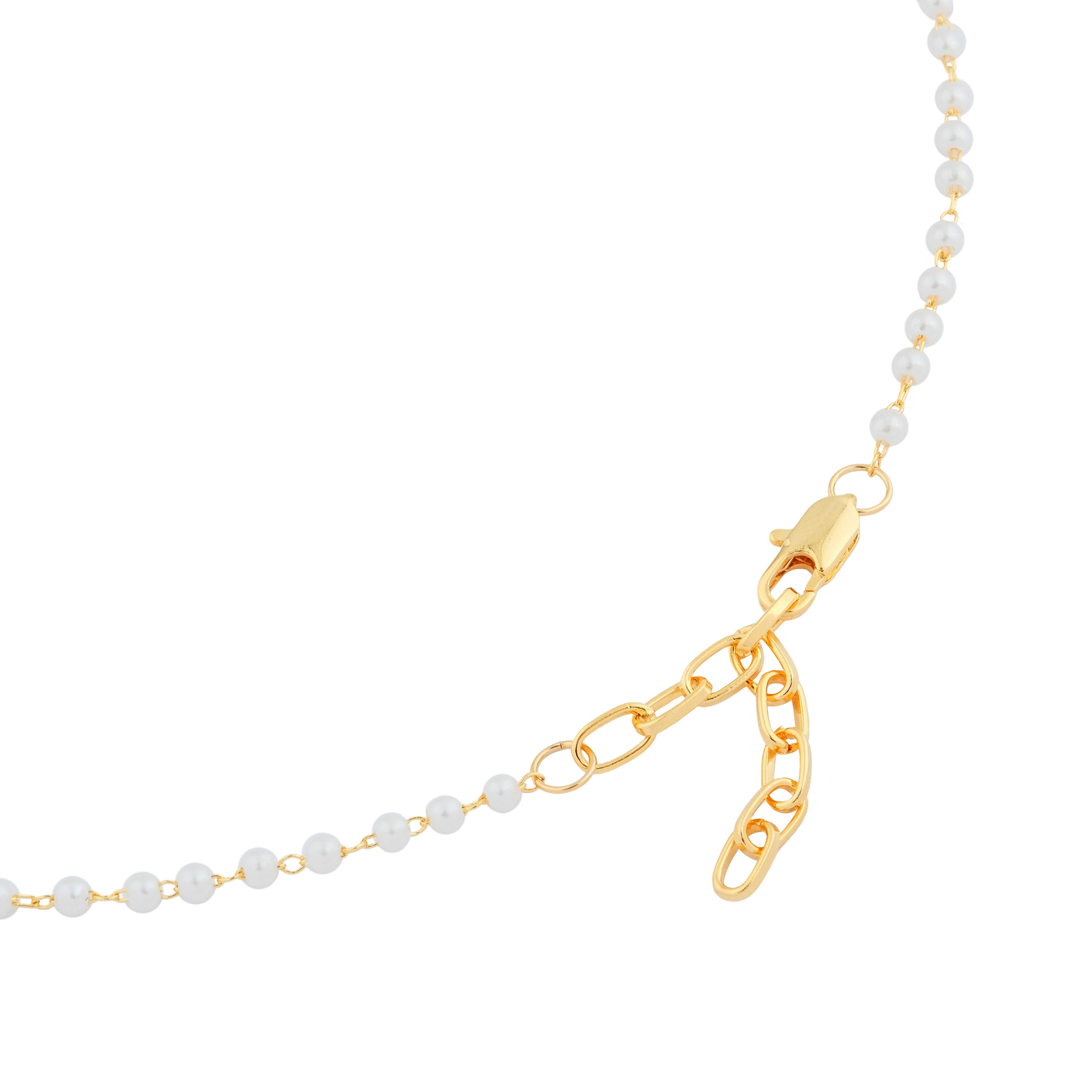 necklace with pearls and a bear pendant with crystals