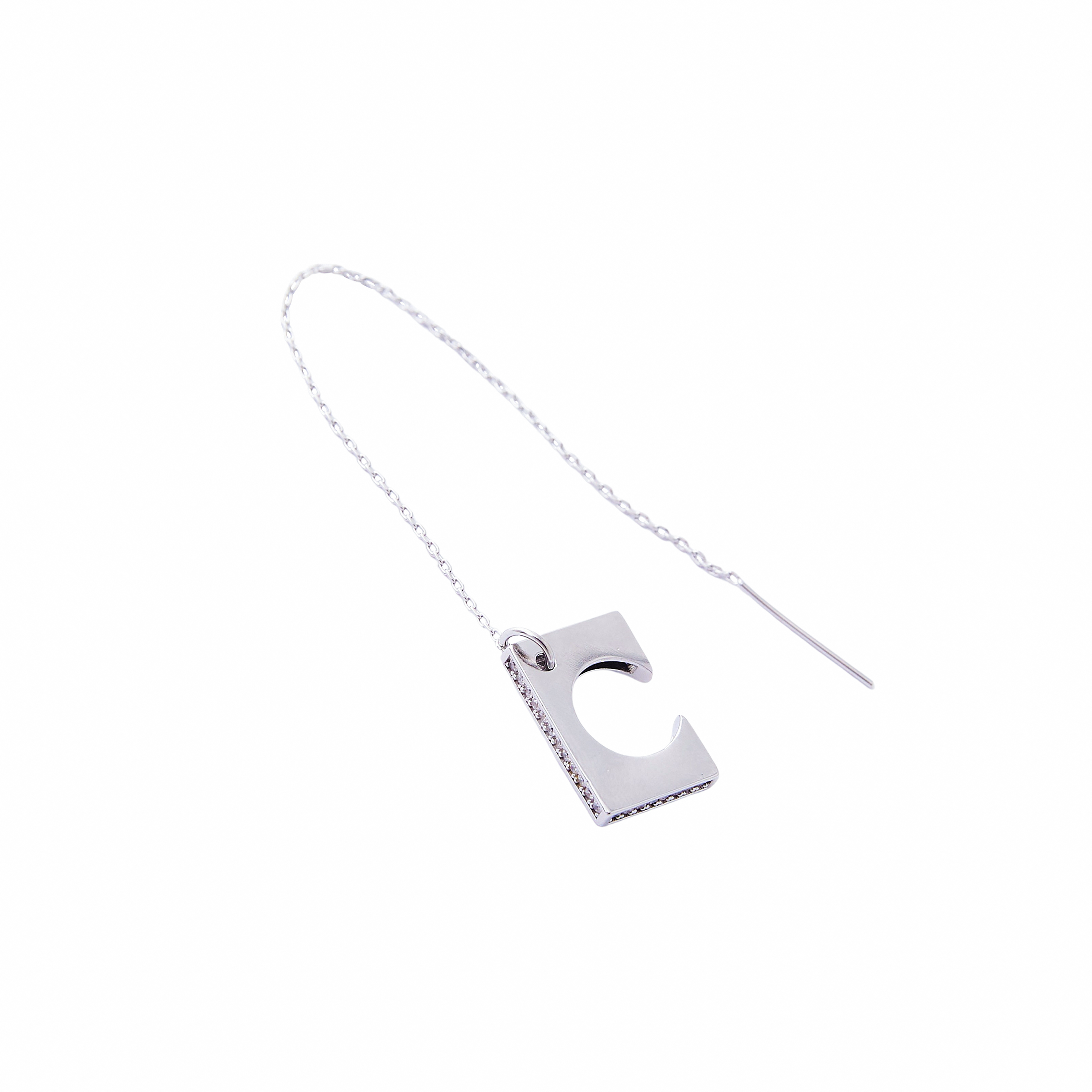 A long silver monoserge with a square cuff with a pavé of crystals