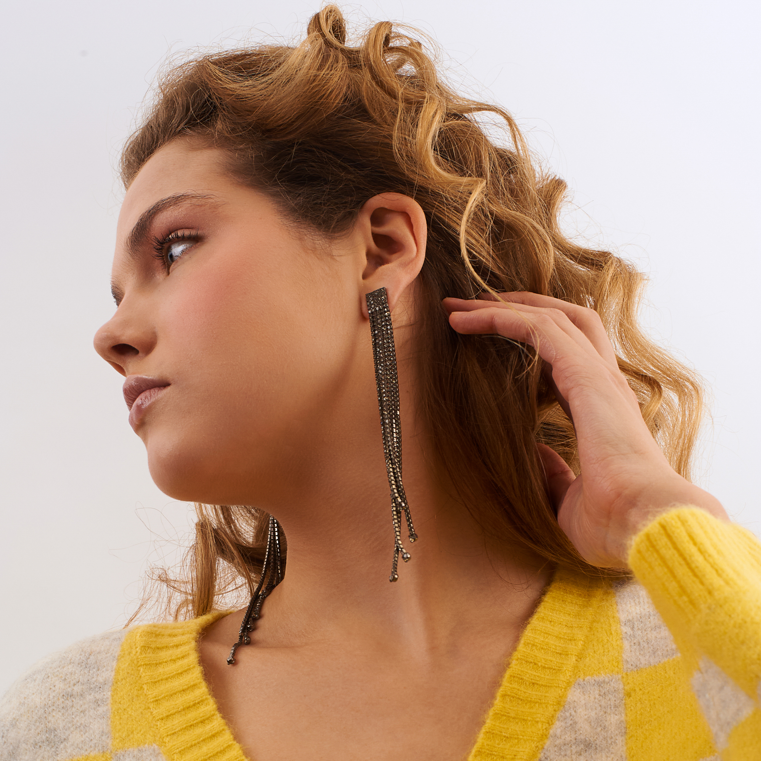 Black earrings with long crystal track pendants