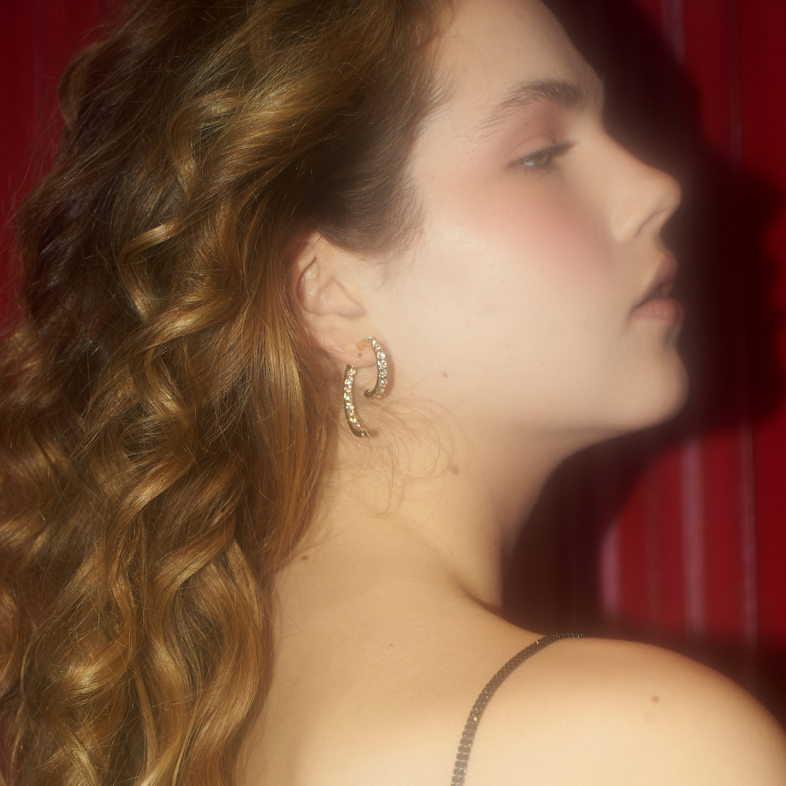 curling earrings with a pavй of crystals
