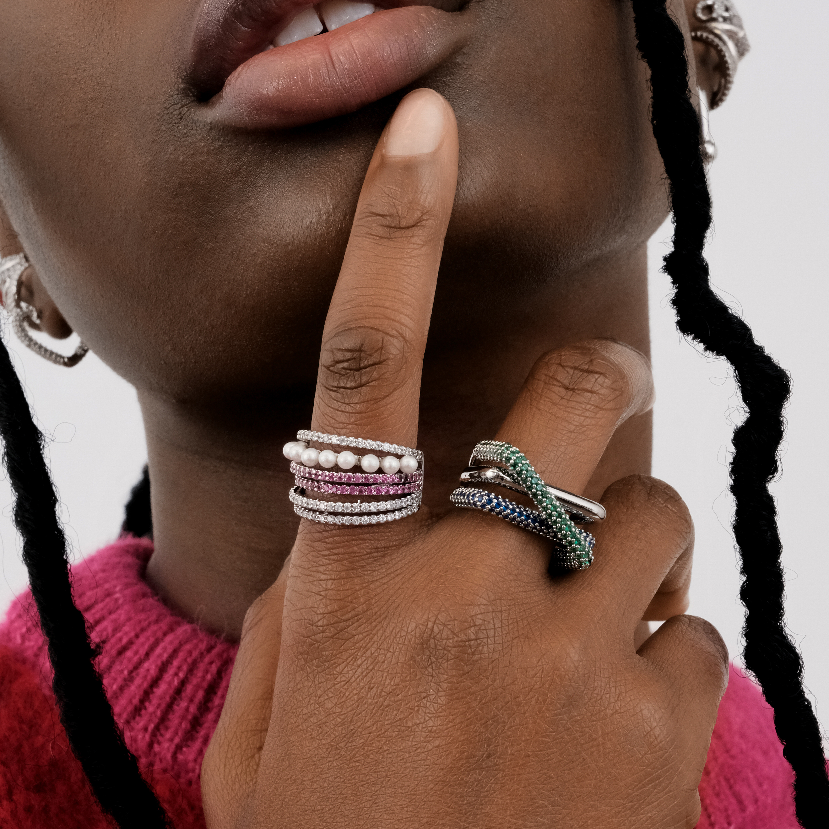 ring of three elements with a pavй of green and blue crystals