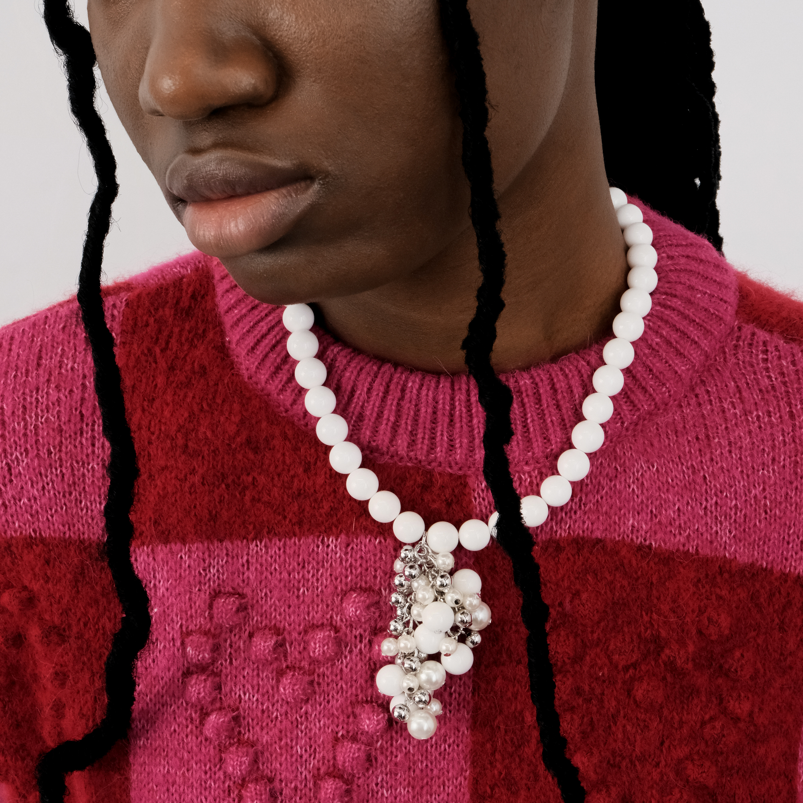 White beads with a cluster of beads