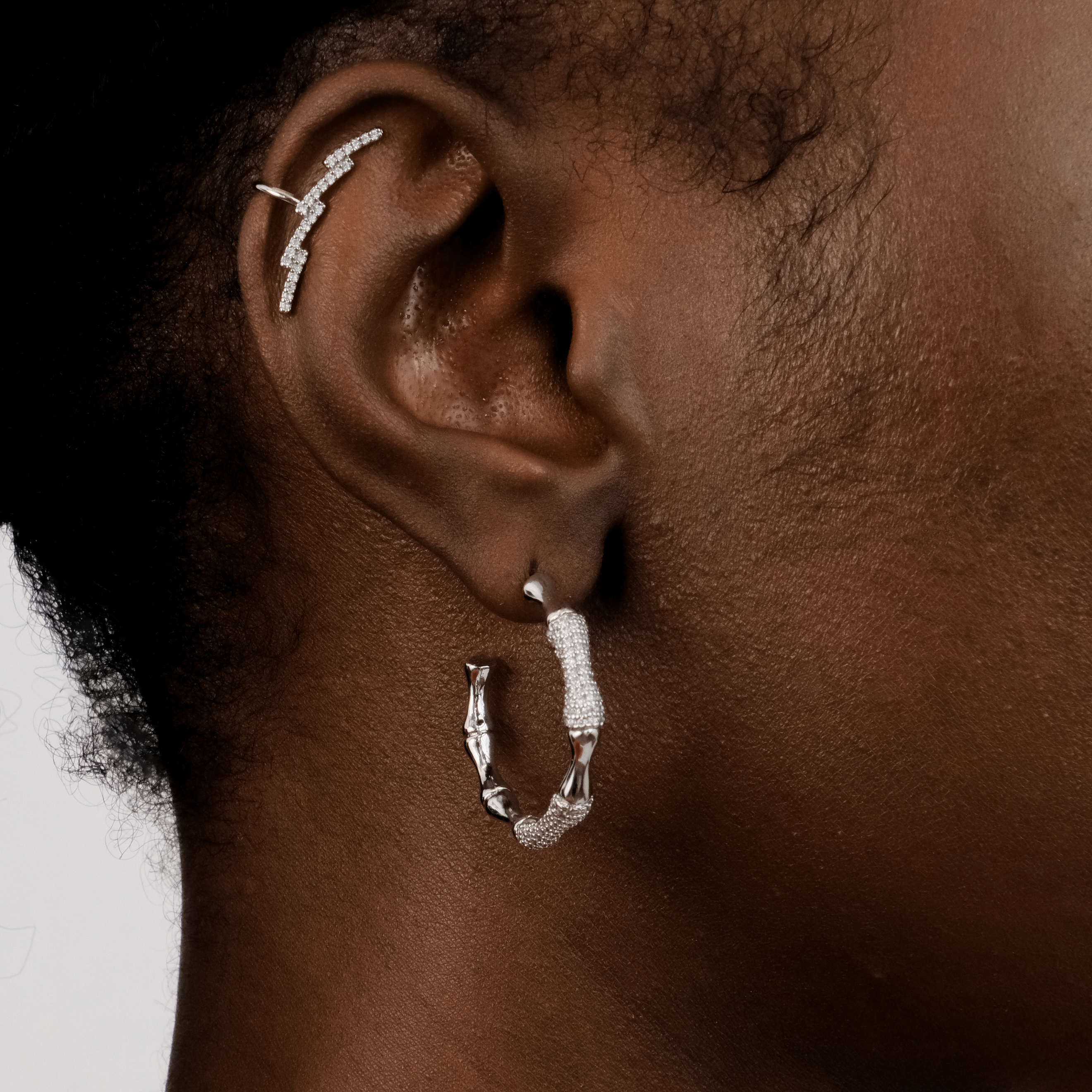 Silver-tone arc cuff with crystal pavé