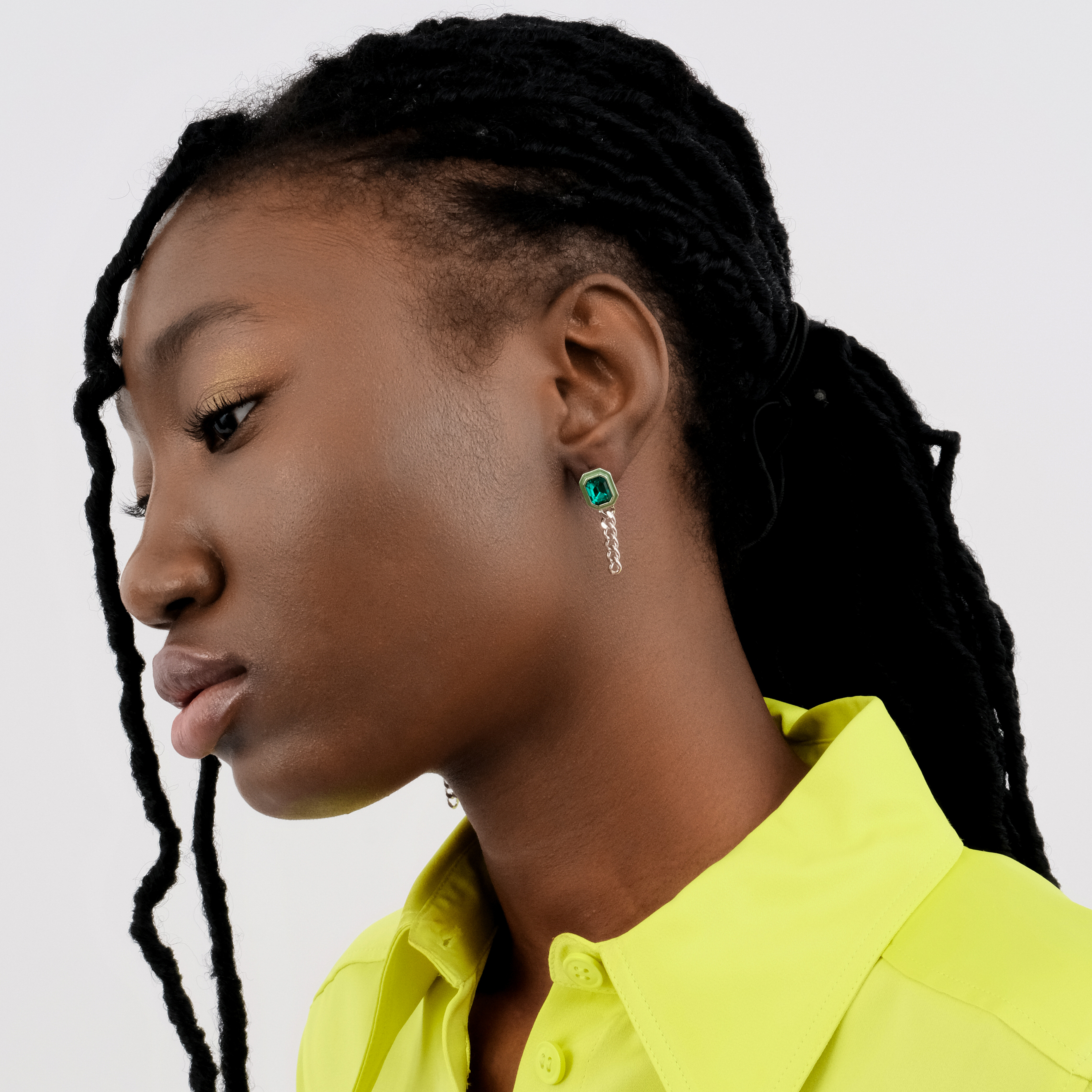 earrings with green crystals and enamel and asymmetric chain pendants