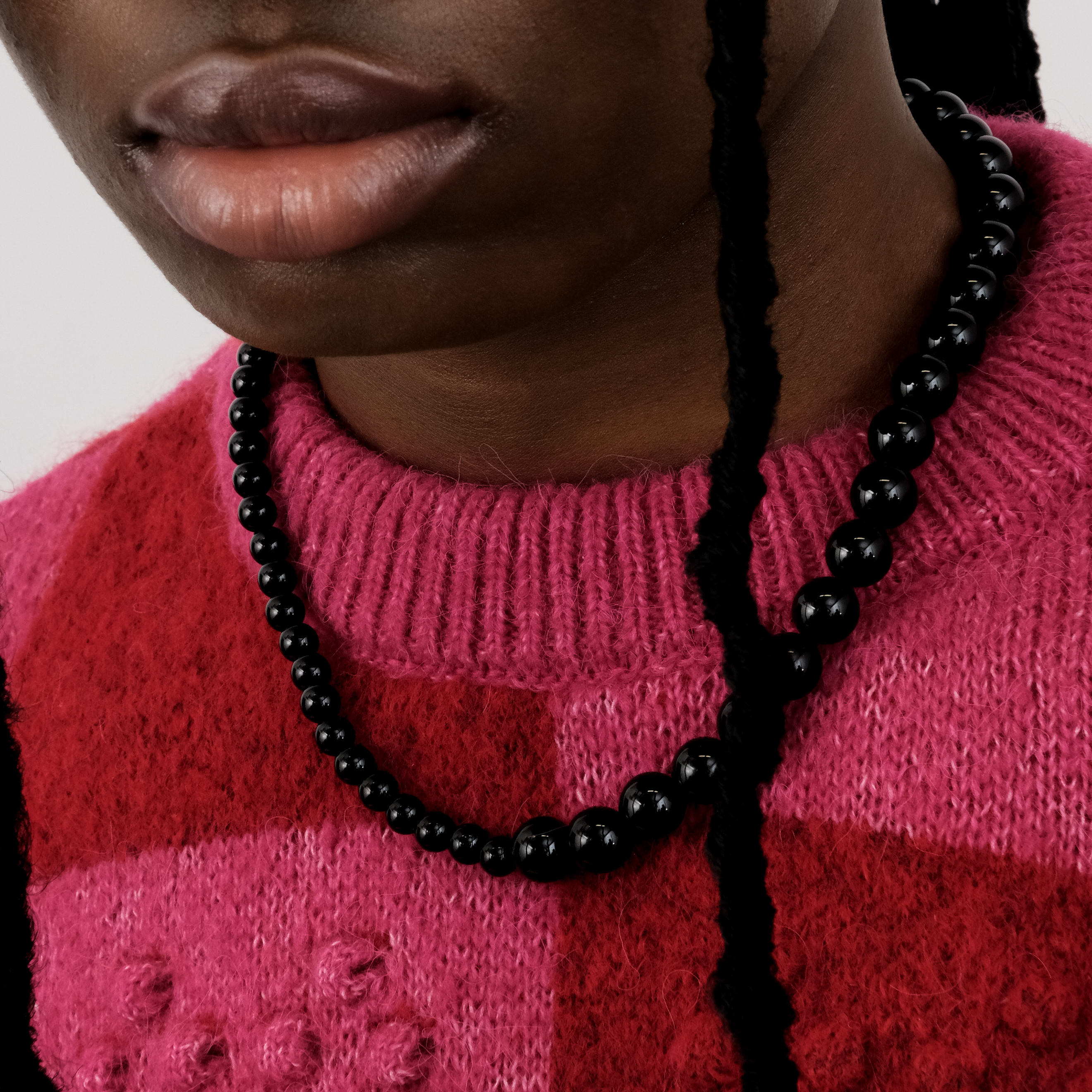 Asymmetric necklace made of black beads