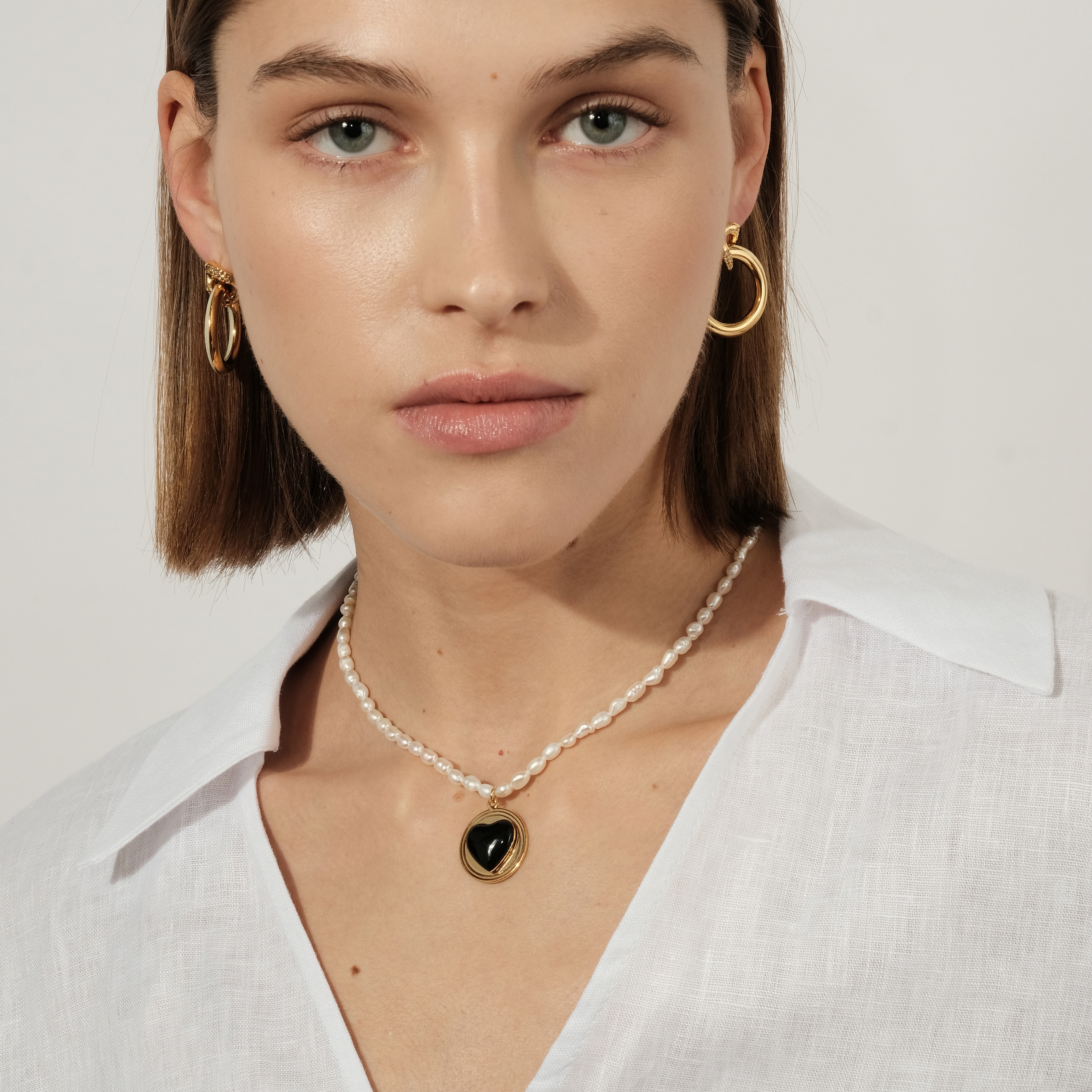 circle earrings with enamel and crystals