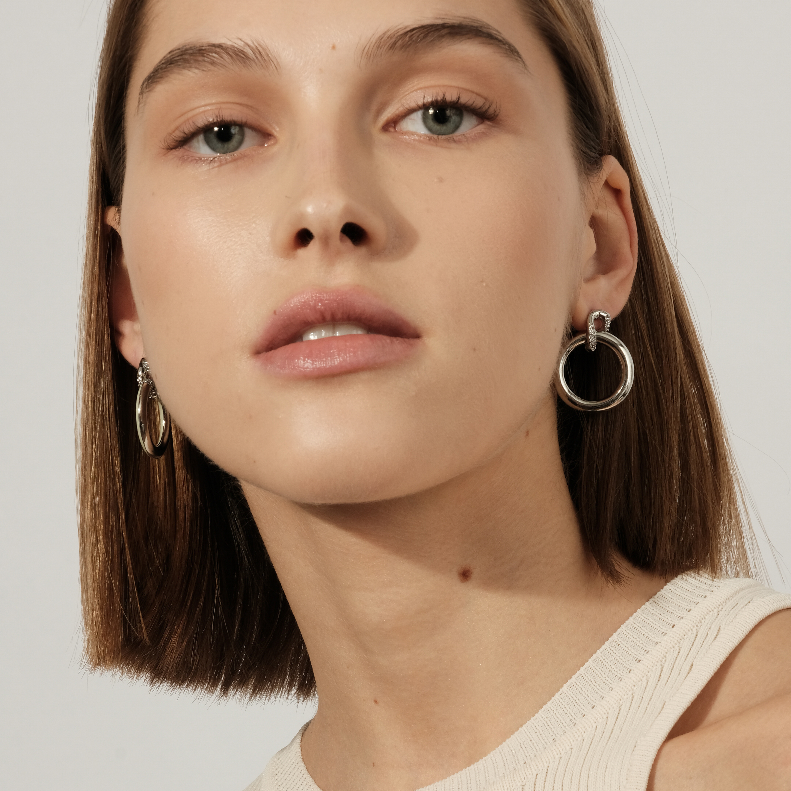 circle earrings with enamel and crystals