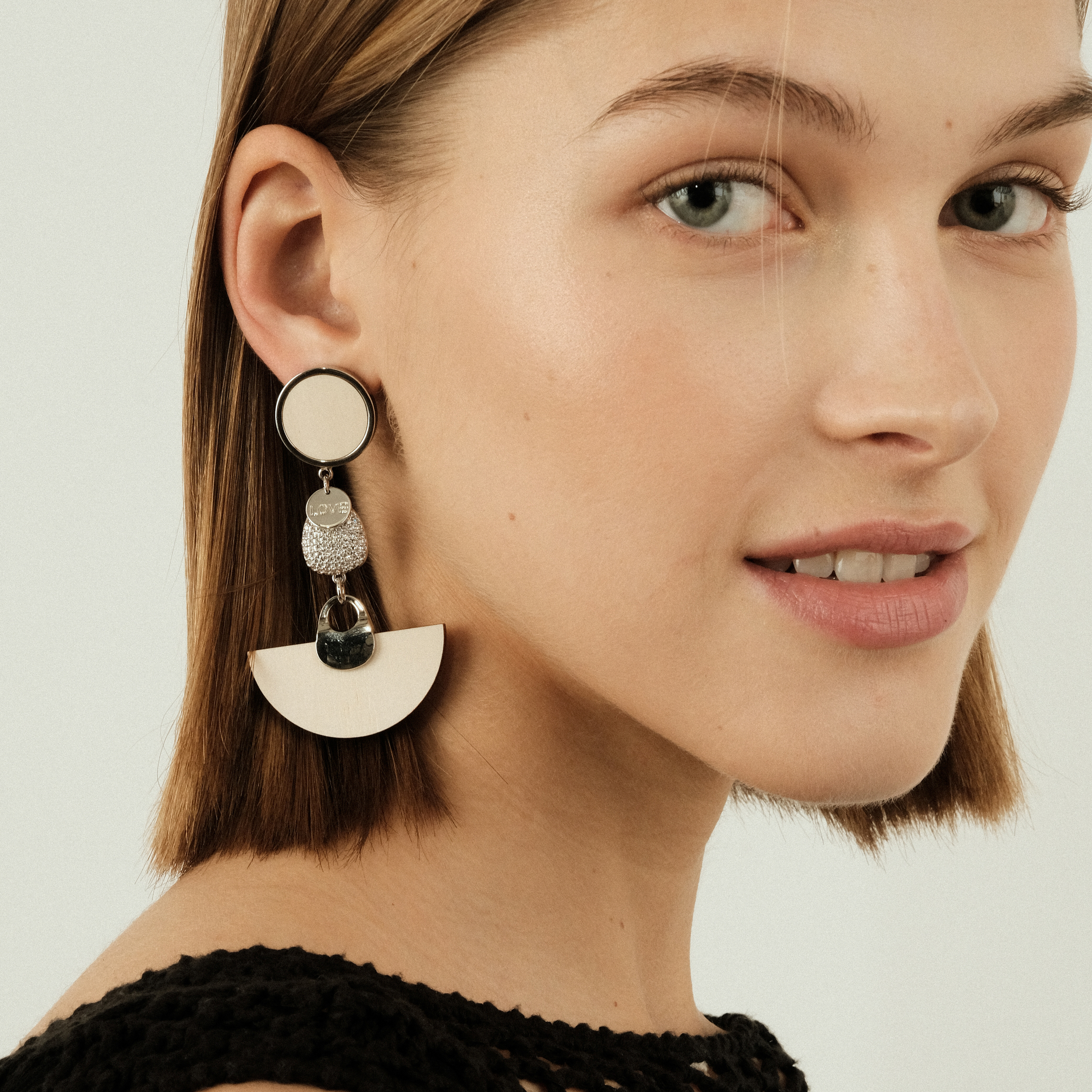 earrings with beige wooden inserts and crystals