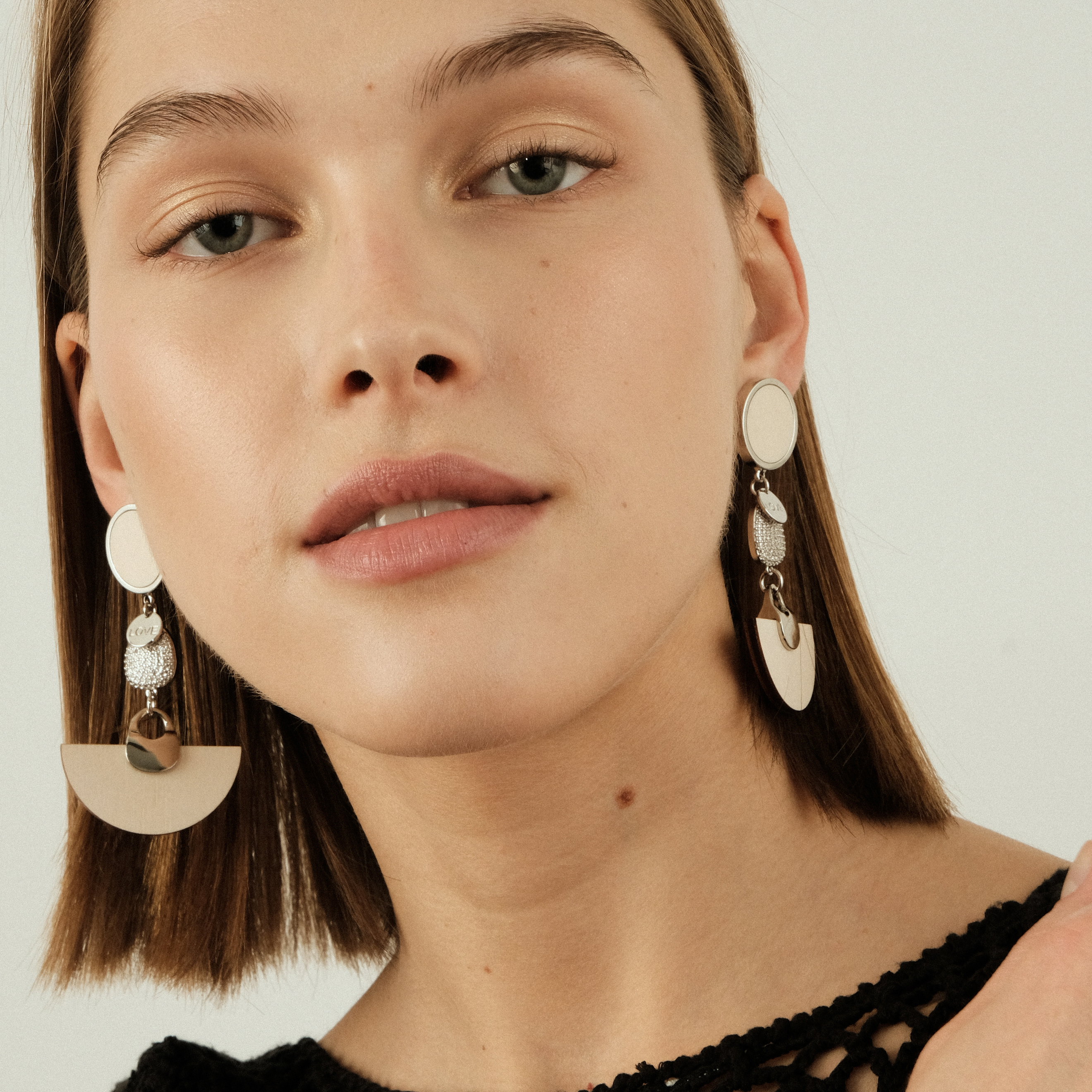 earrings with beige wooden inserts and crystals