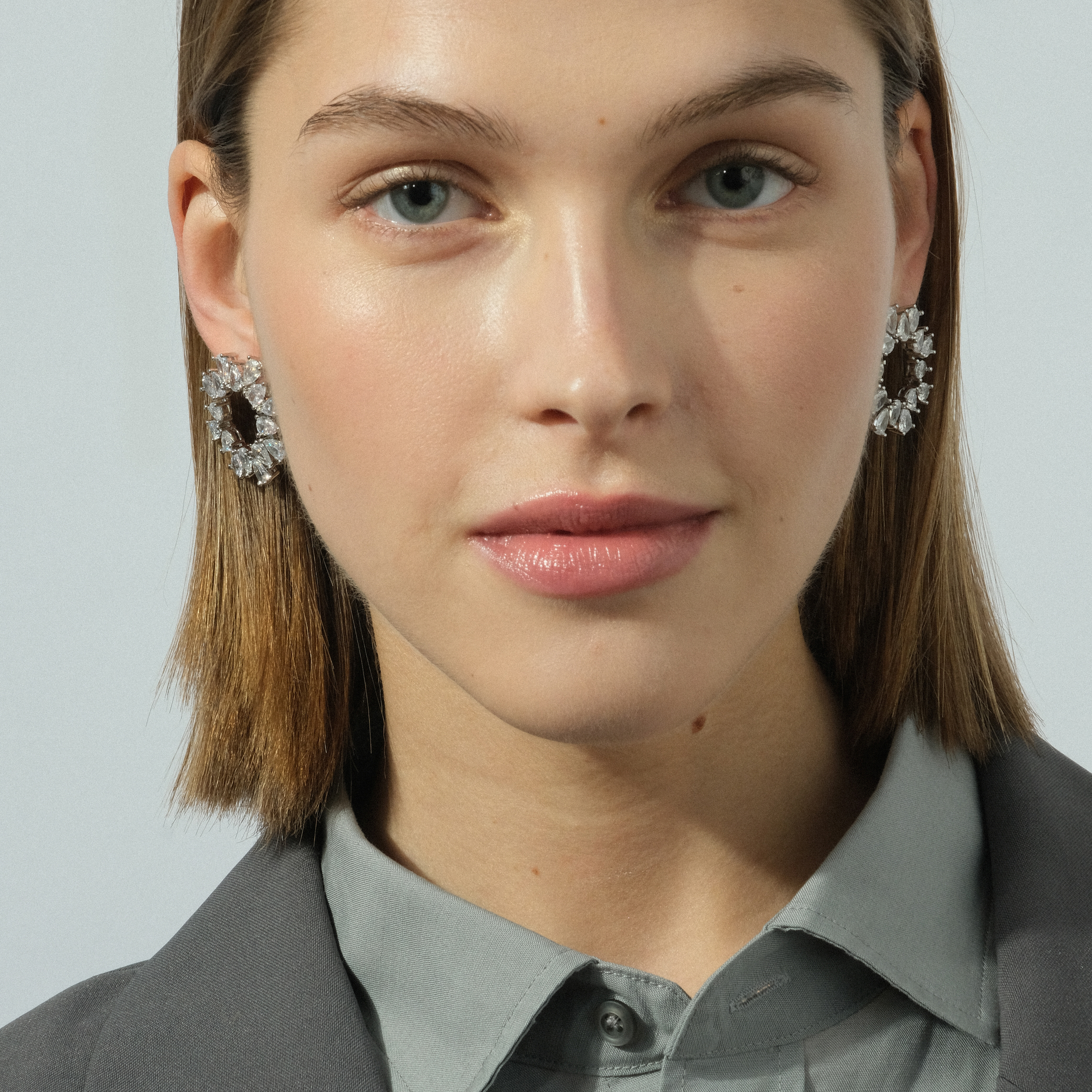 round earrings with crystals