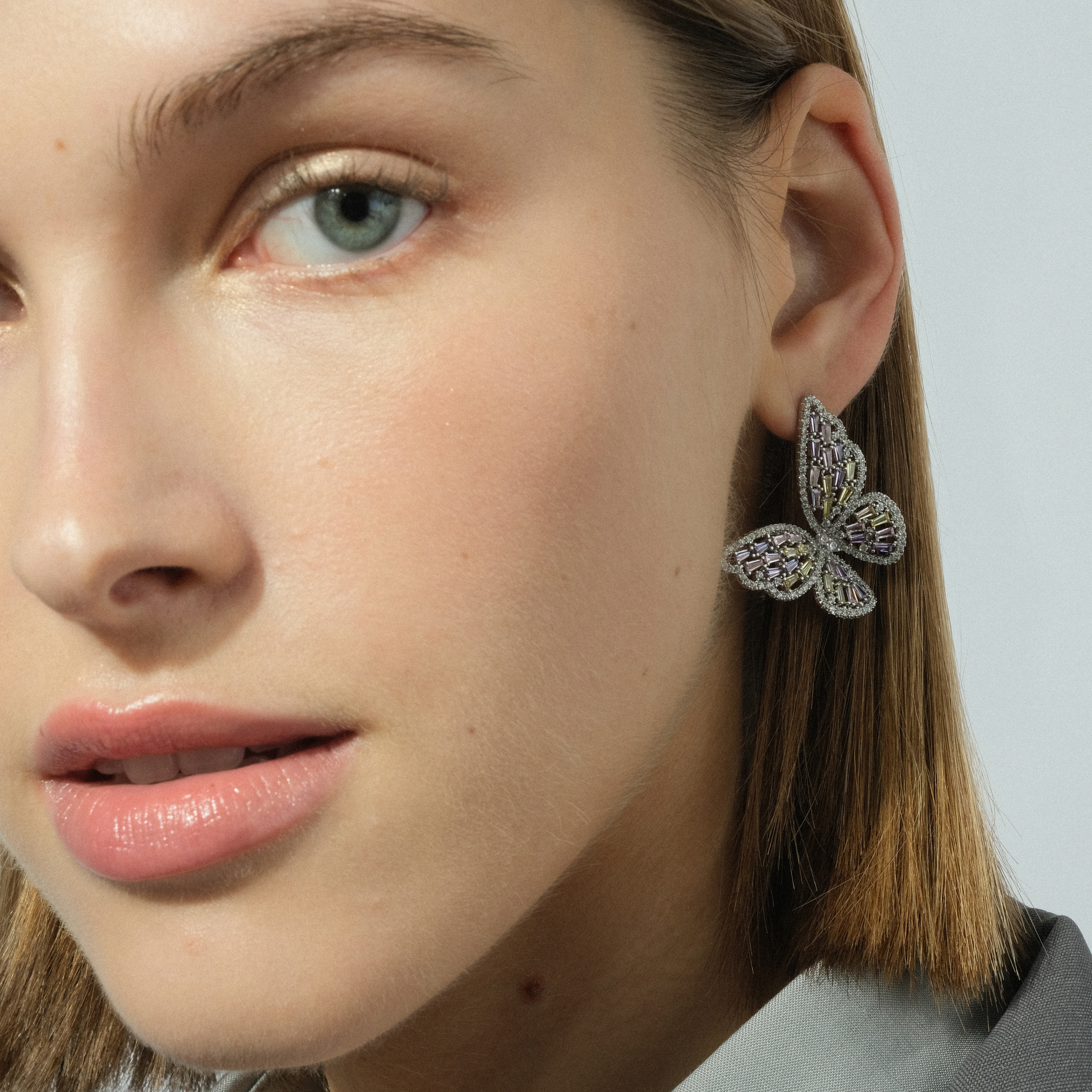 butterflearrings with multicolored crystals