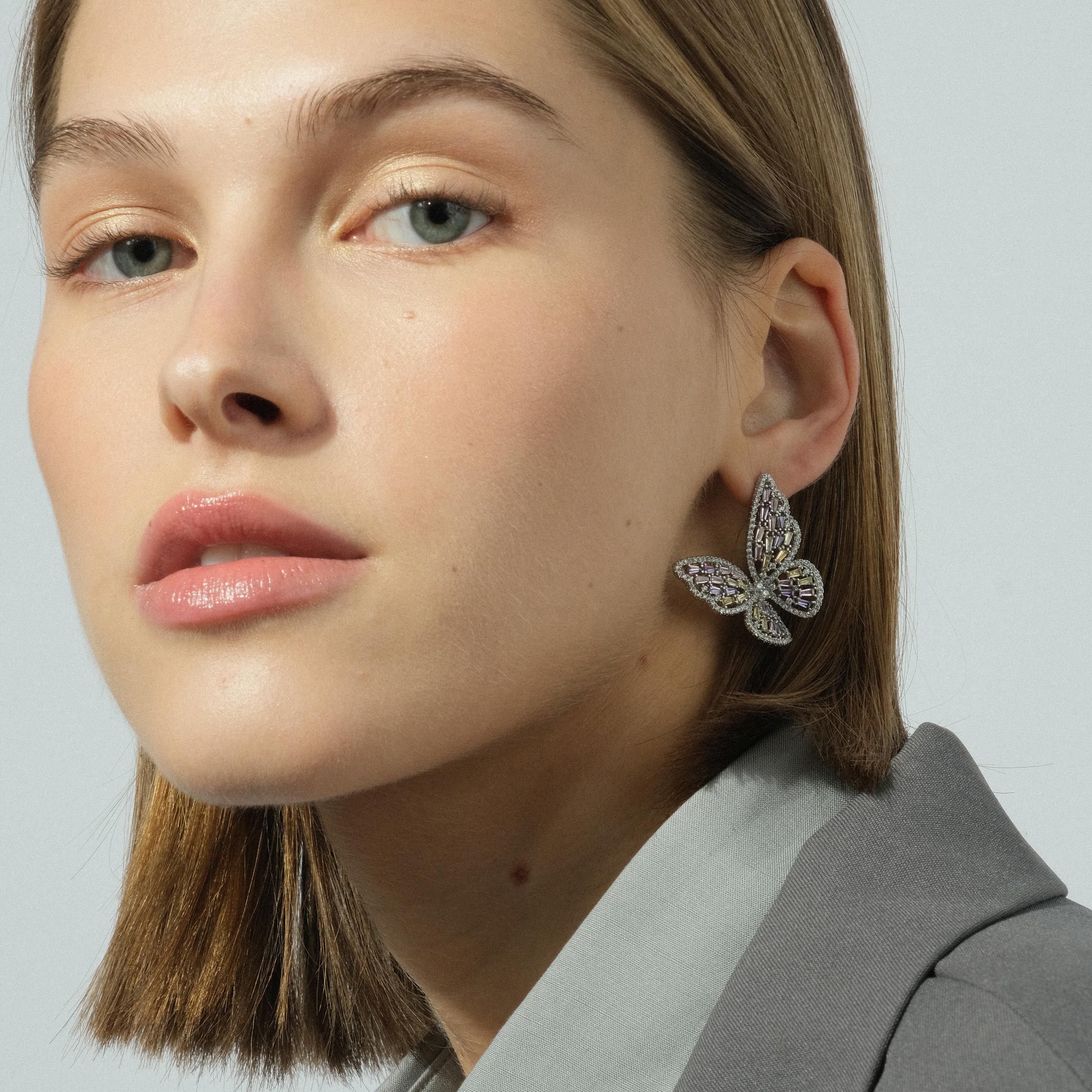 butterflearrings with multicolored crystals