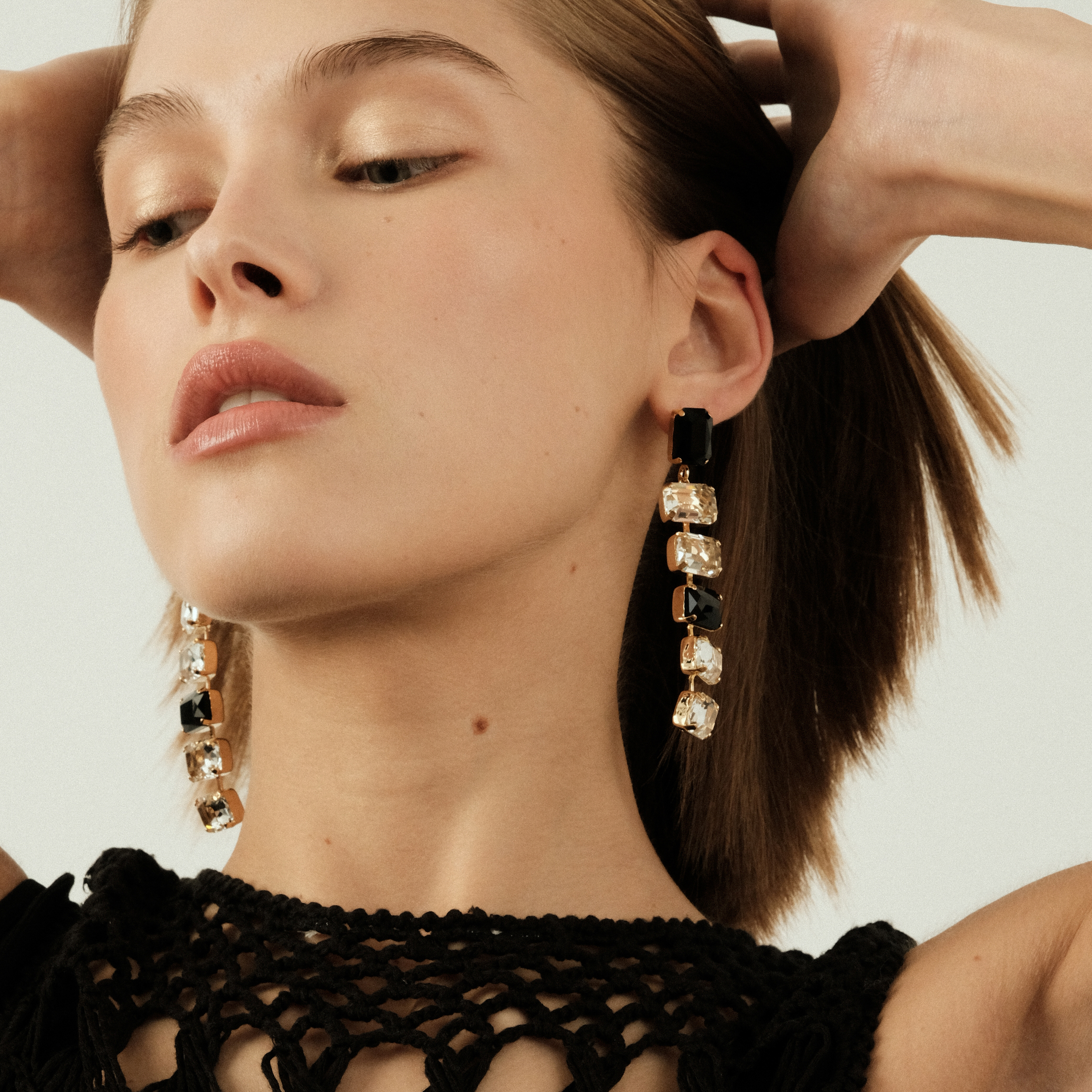 Earrings with large crystals in black and white